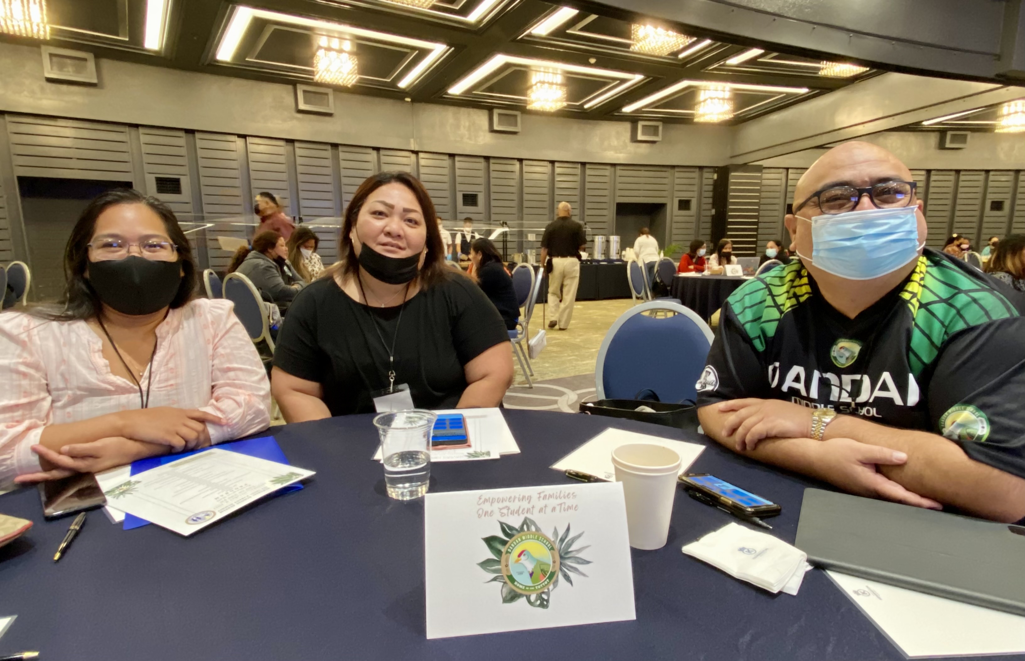 Dandan Middle School PTSA officer Norelyn Tenorio with DMS principal James Sablan and MHS vice principal Melanie Rdiall.