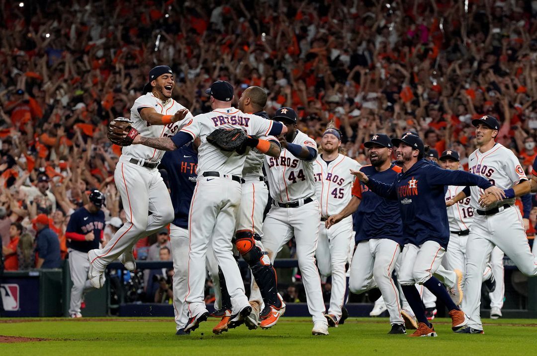 Houston Astros relief pitcher Ryan Pressly (55) celebrates with teammates after defeating the Boston Red Sox on Oct 22, 2021 in Houston, Texas to advance to the World Series.
