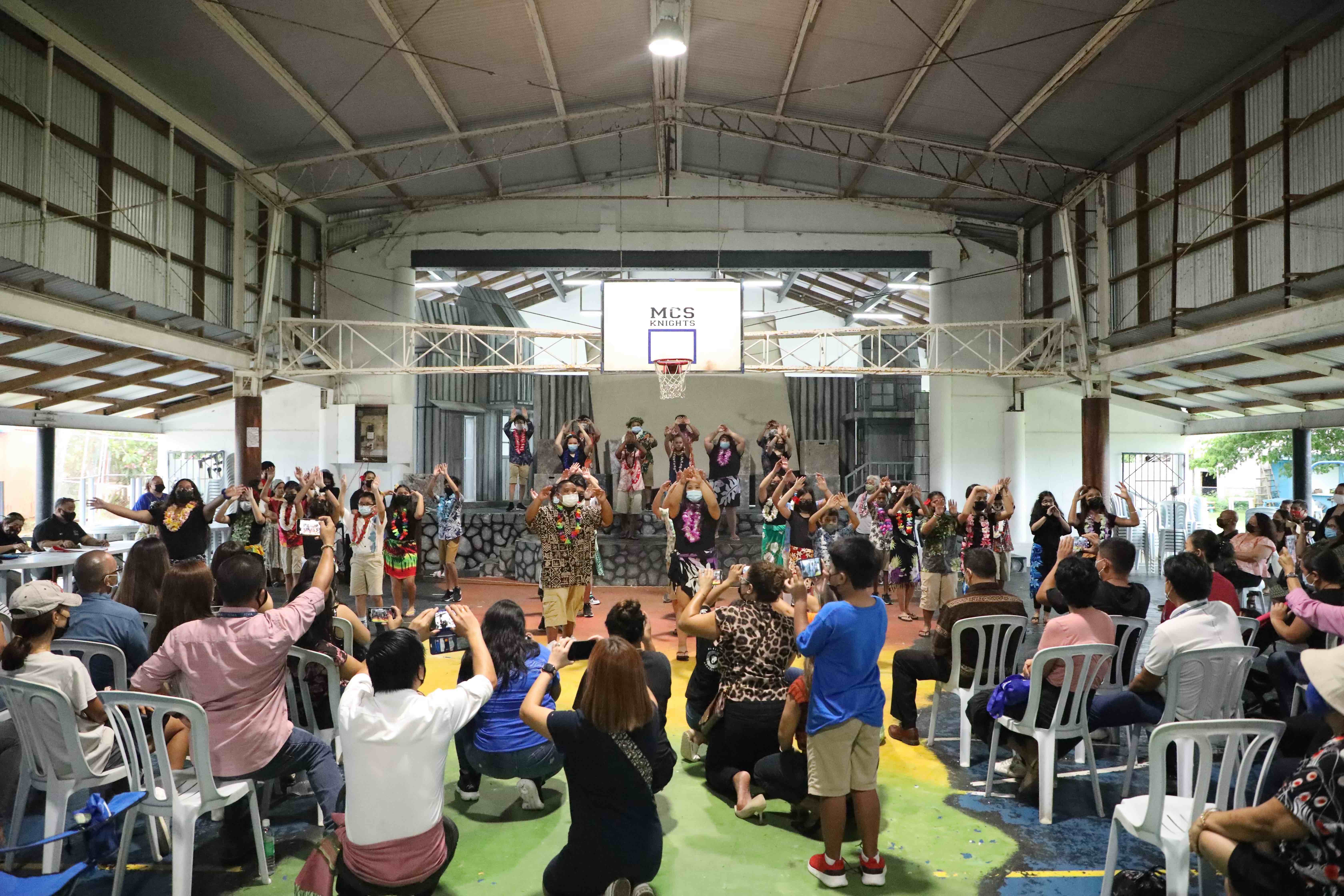 Mount Carmel School’s sixth-grade class represented Hawaii with the crowd’s favorite song “Hawaiian Roller Coaster Ride” during the school’s reinstated Cultural Day celebration.