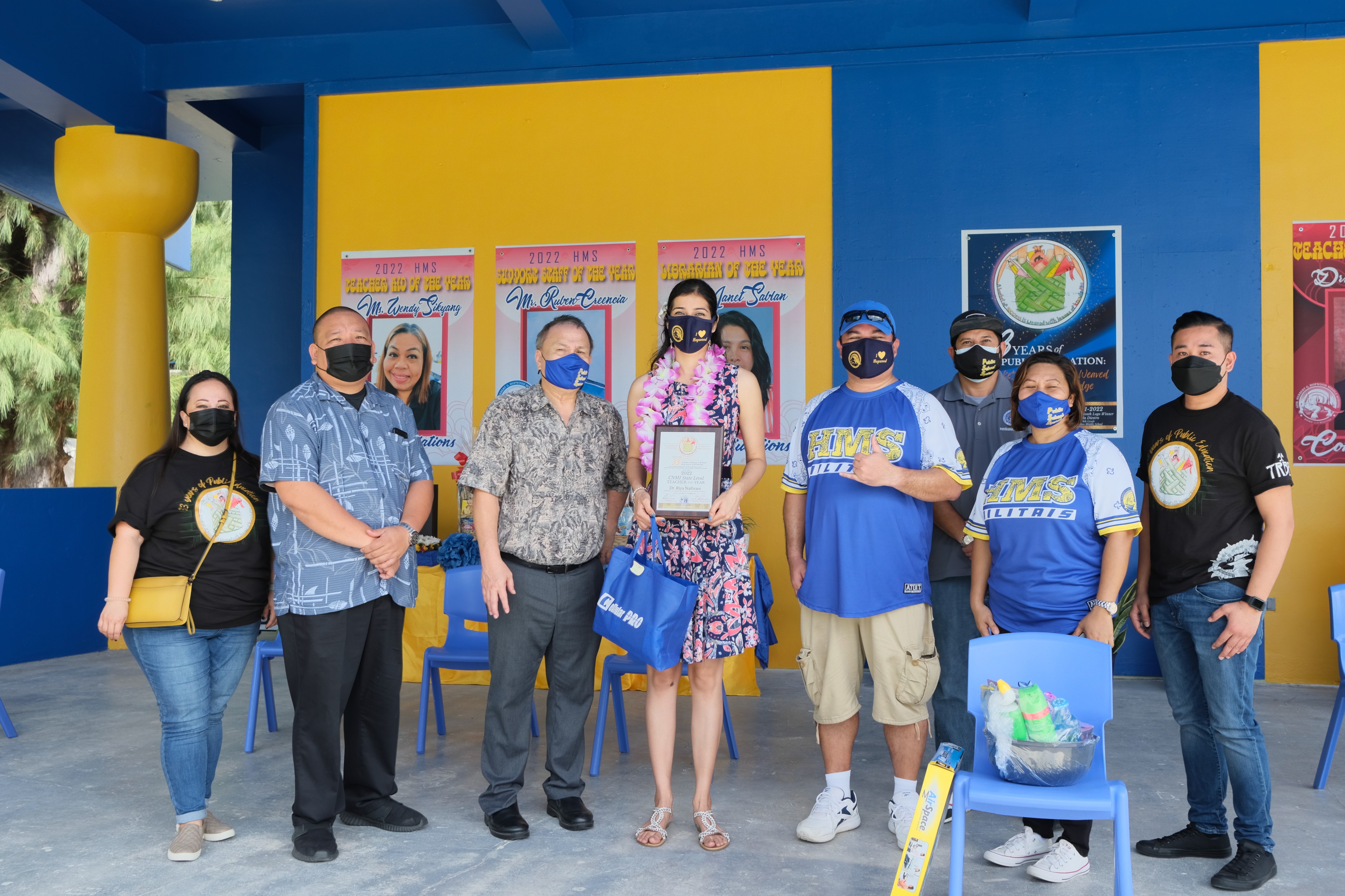 Hopwood Middle School’s Dr. Riya Nathrani, 5th right, is the 2022 CNMI PSS State Teacher of the Year. Also in photo are PSS and BOE officials, Hopwood principal Vic Borja and vice principal Karen Manuel.