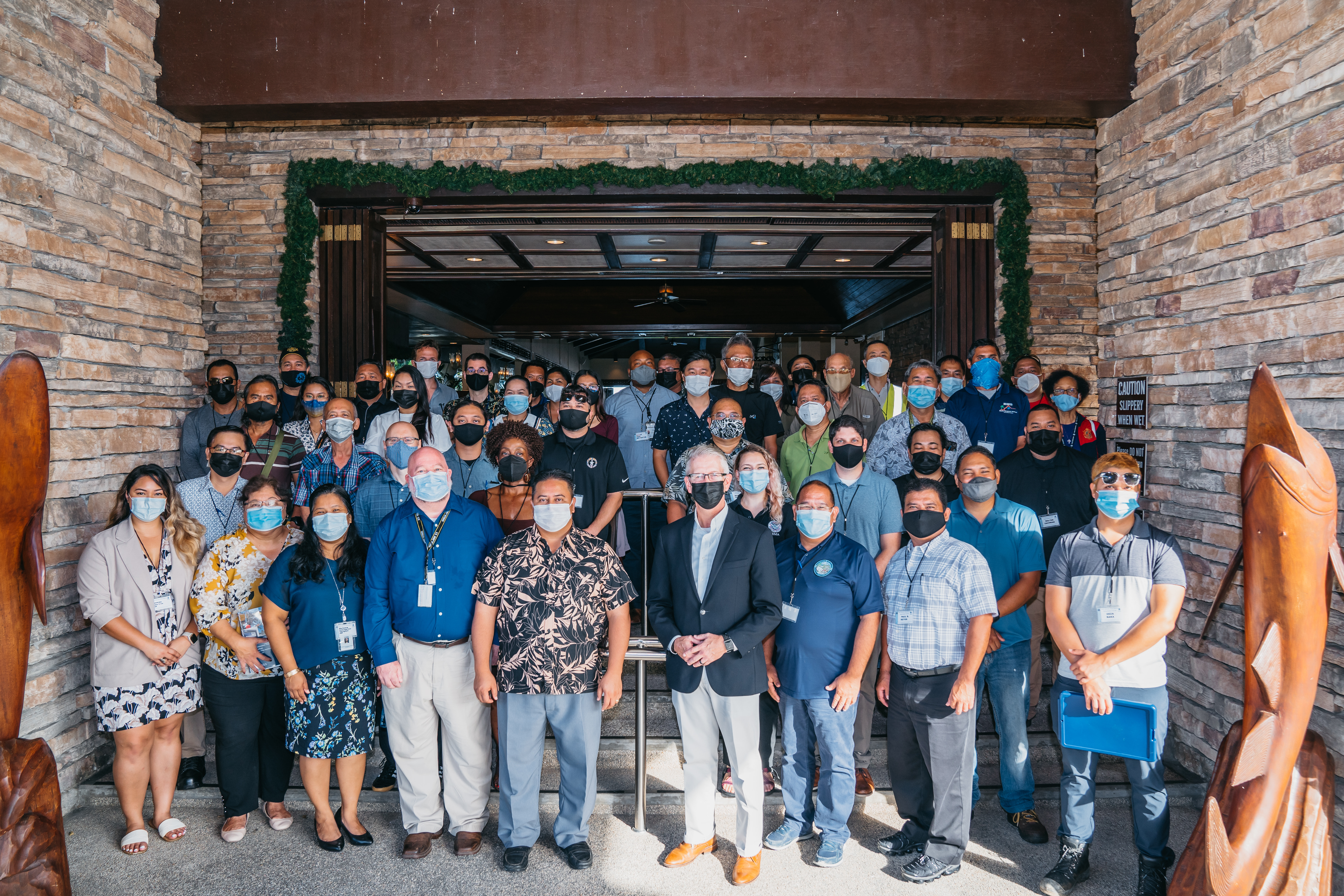Gov. Ralph DLG Torres, CNMI and FEMA officials pose for a photo with the participants of the construction training session held Tuesday at Aqua Resort Club.