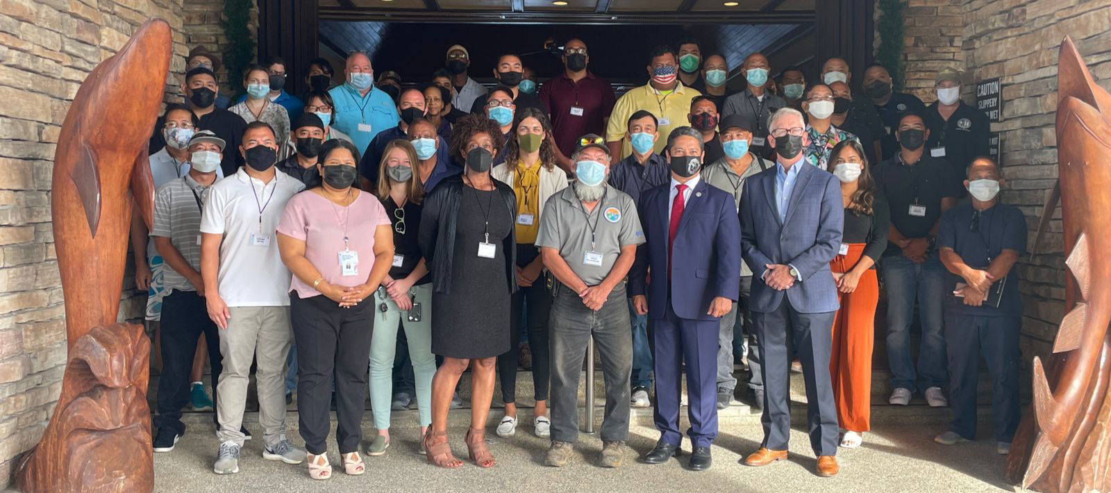 Trainers and participants in the second session of the infrastructure recovery training conducted by the Federal Emergency Management Agency pose for a photo  Monday at Aqua Resort Club.