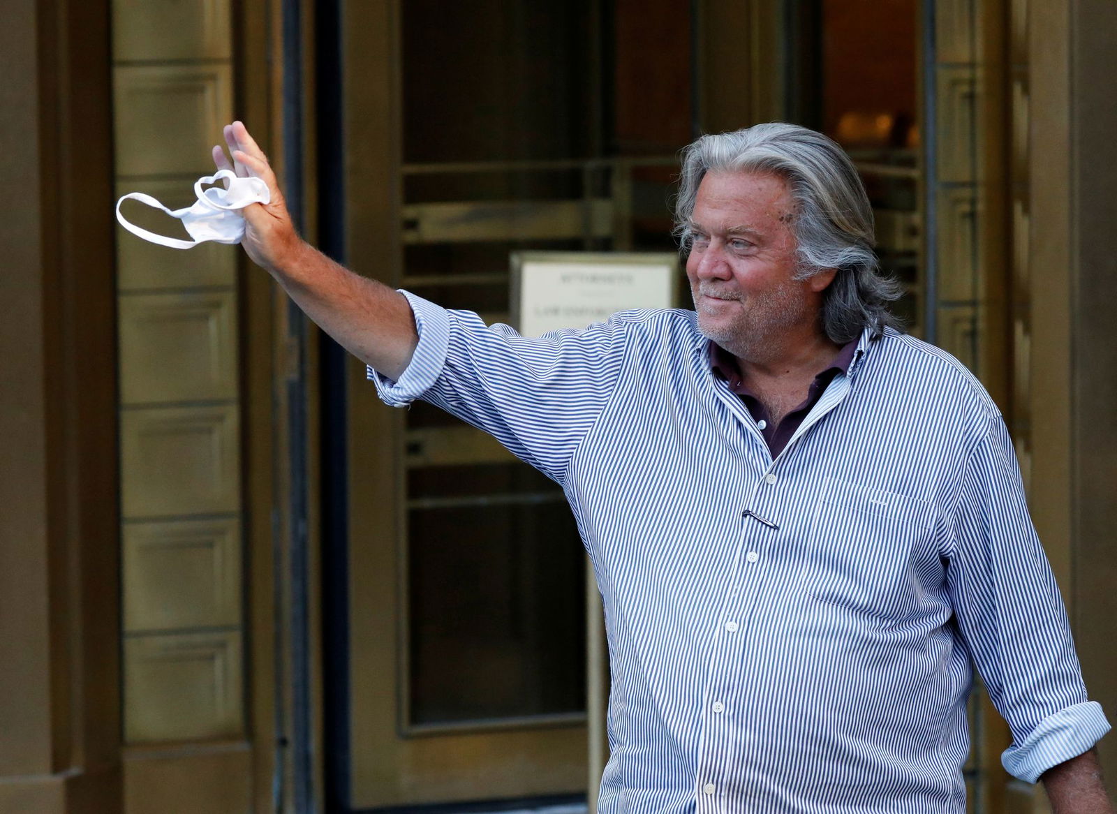 Former White House Chief Strategist Steve Bannon exits the Manhattan Federal Court, following his arraignment hearing for conspiracy to commit wire fraud and conspiracy to commit money laundering, in the Manhattan borough of New York City on Aug. 20, 2020.
