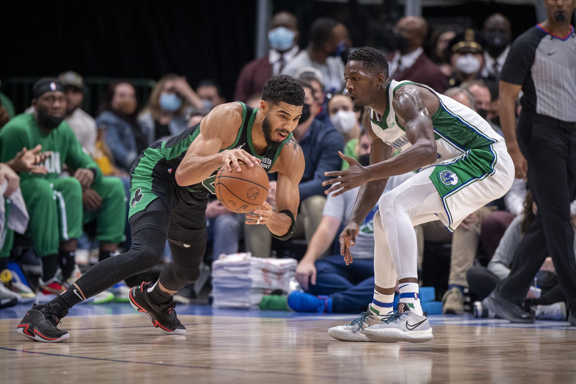 Dallas Mavericks forward Dorian Finney-Smith (10) defends against Boston Celtics forward Jayson Tatum (0) during the second half at the American Airlines Center in Dallas, Texas on Nov. 6, 2021.