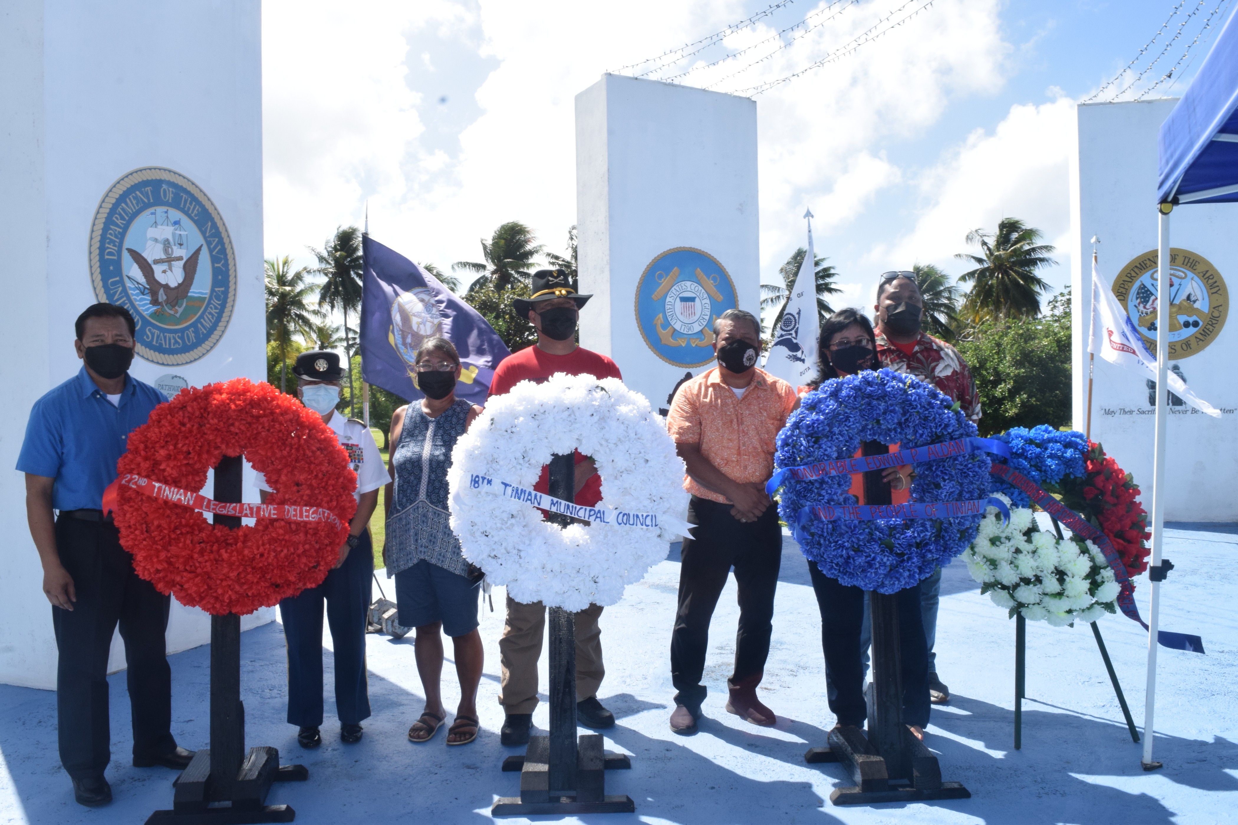 Tinian officials pose for a photo prior to the wreath-laying ceremony.