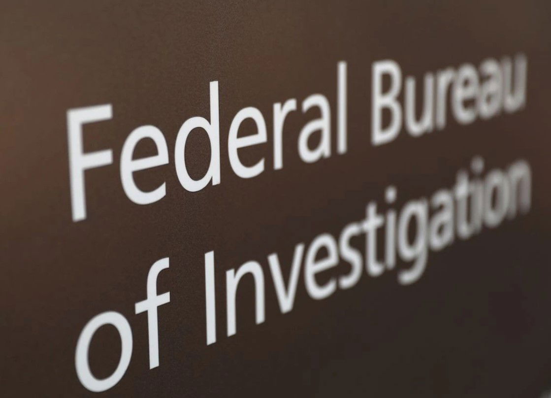 A sign of the Federal Bureau of Investigation is seen outside of the J. Edgar Hoover FBI Building in Washington, D.C., March 12, 2019.
