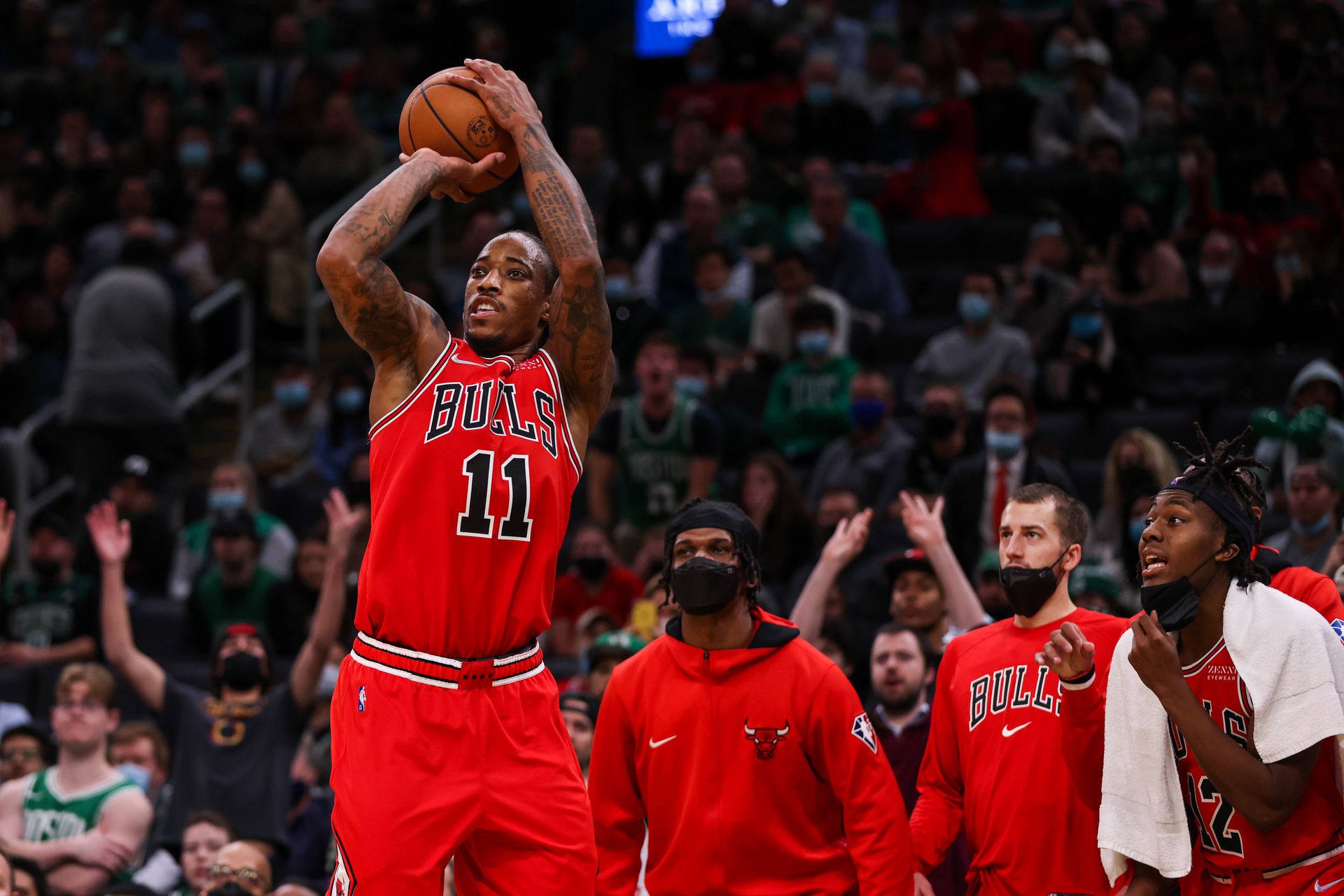 Chicago Bulls forward DeMar DeRozan (11) shoots during the second half against the Boston Celtics at TD Garden in Boston, Massachusetts on  Nov. 1, 2021.