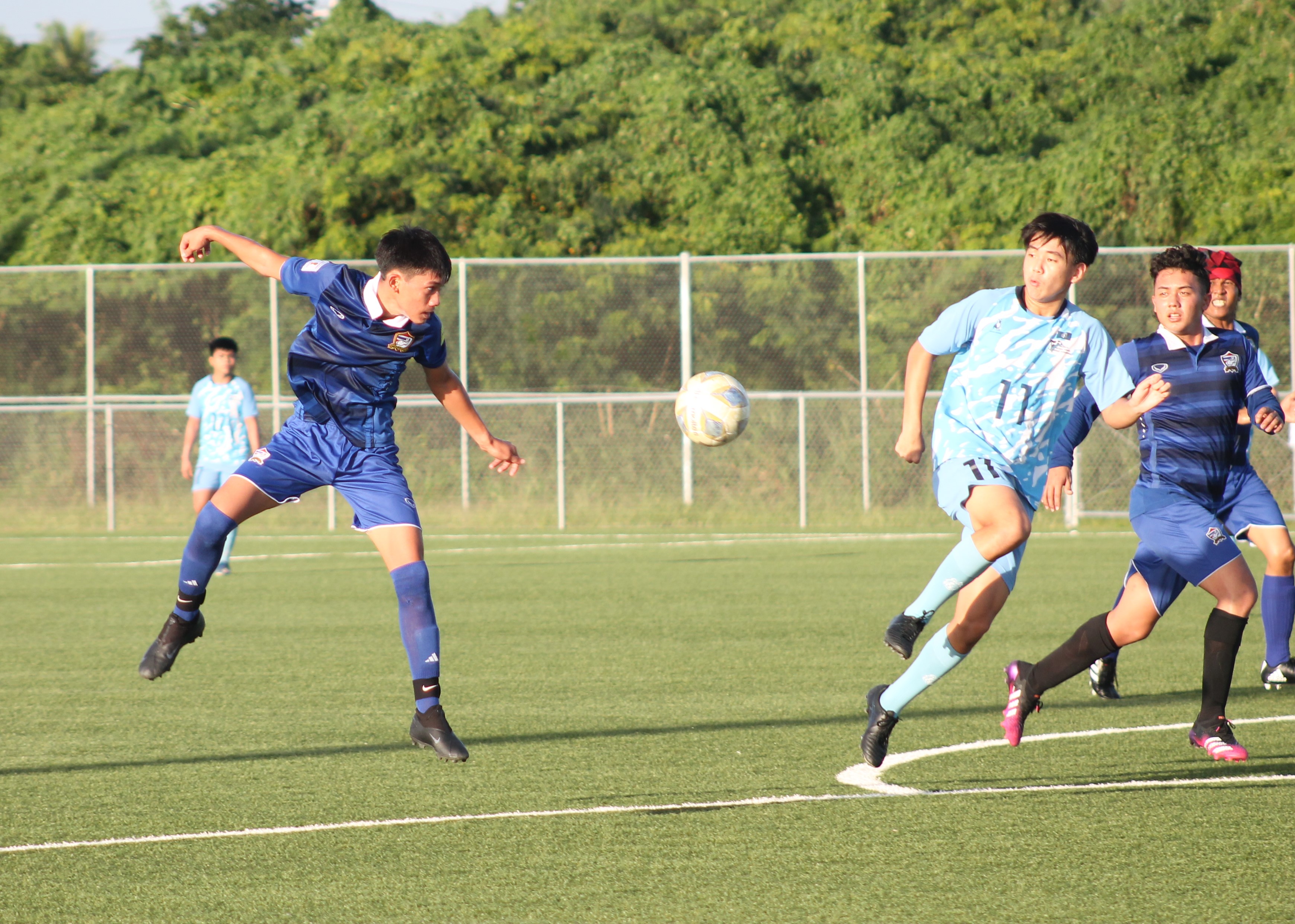 Eleven Tiger's Floyd Muna sets up the play with a header.