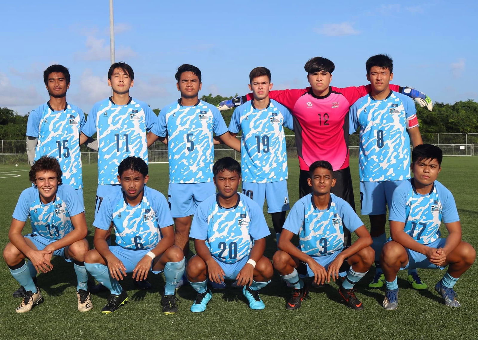 The NMI U18 team members pose for a photo before the start of the Marianas Soccer League championship game  at the NMI Soccer Training Center in Koblerville.