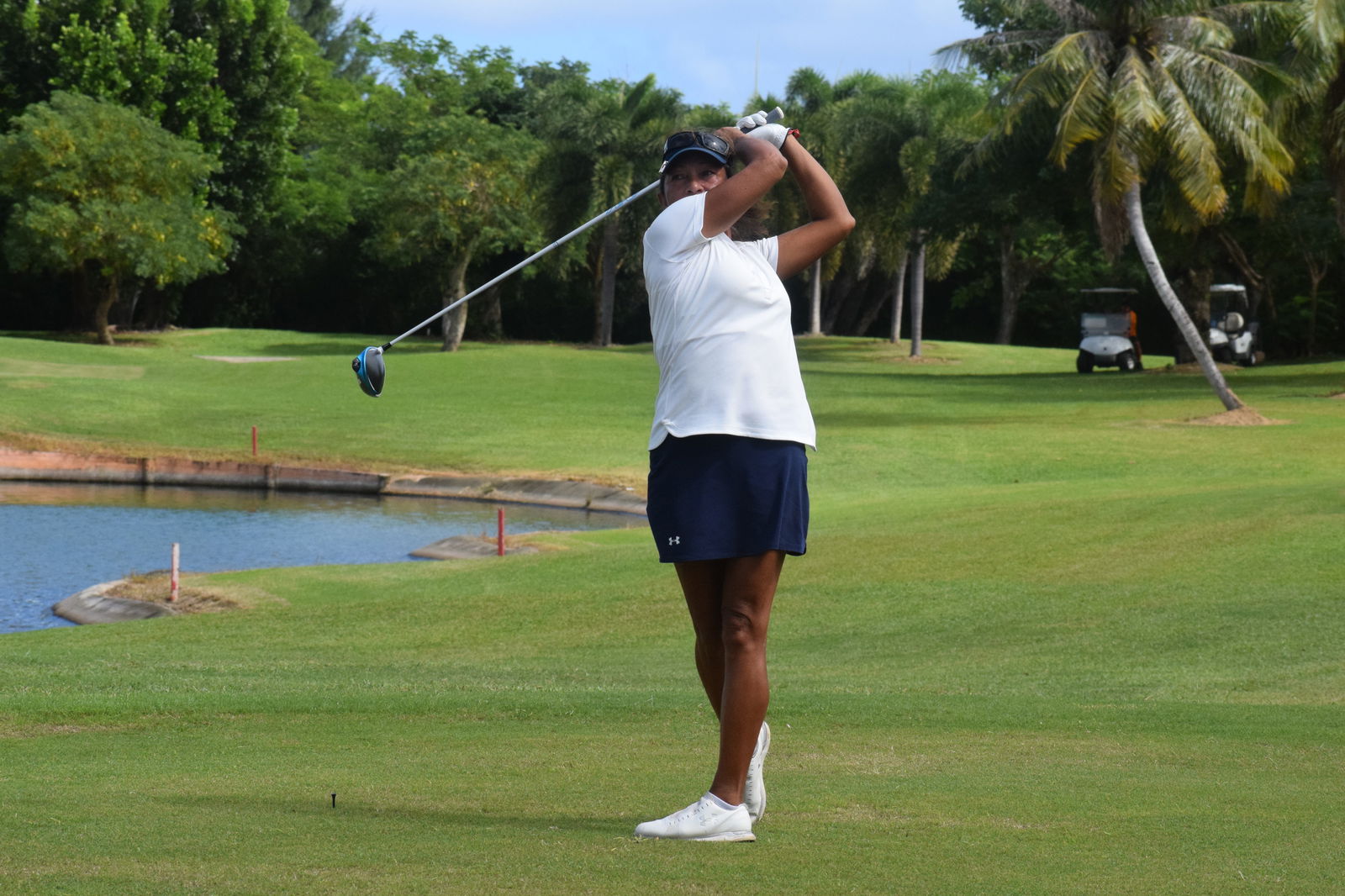 Janet Torres tees off to Hole No. 14.