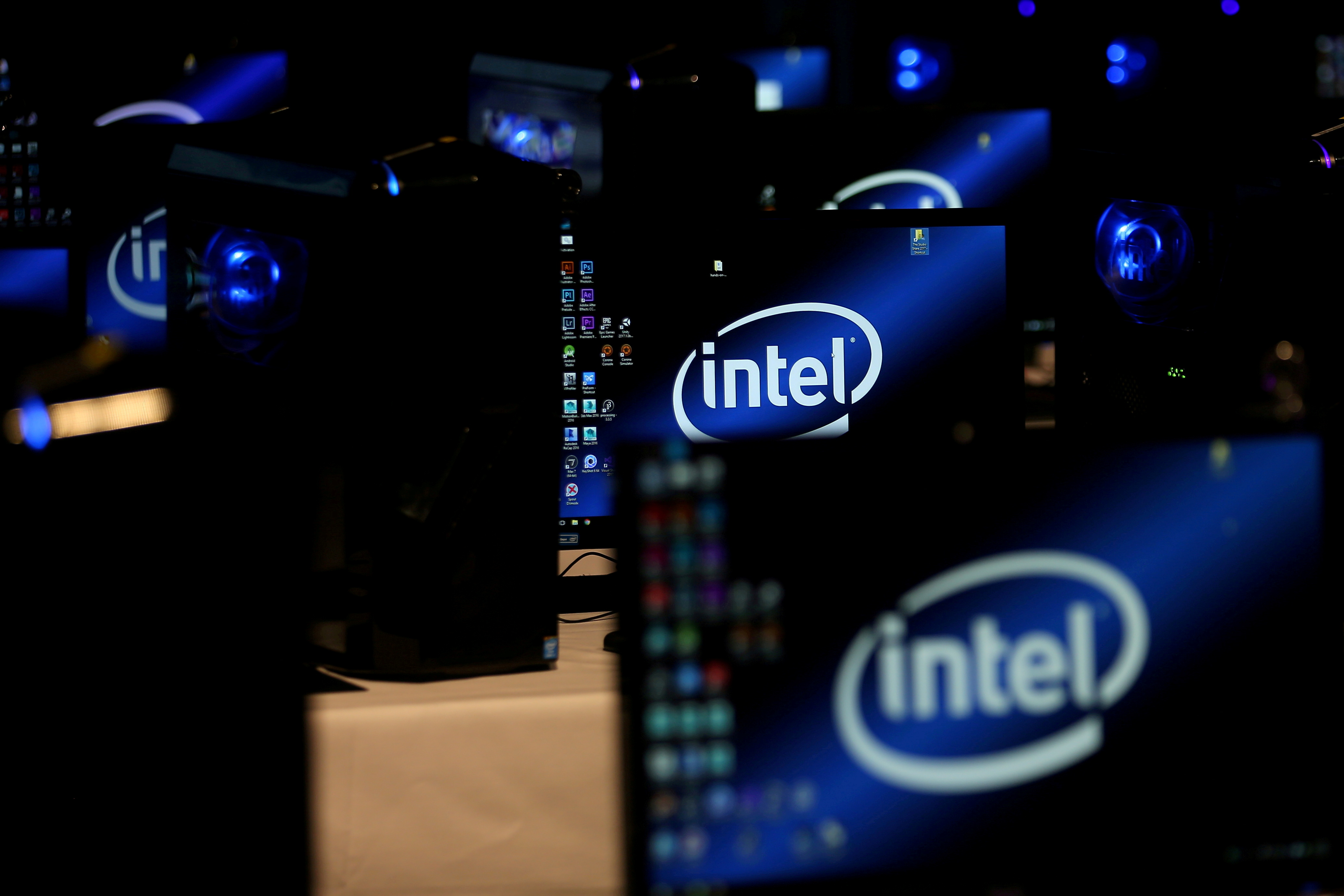 The Intel logo is displayed on computer screens at SIGGRAPH 2017 in Los Angeles, California, July 31, 2017.