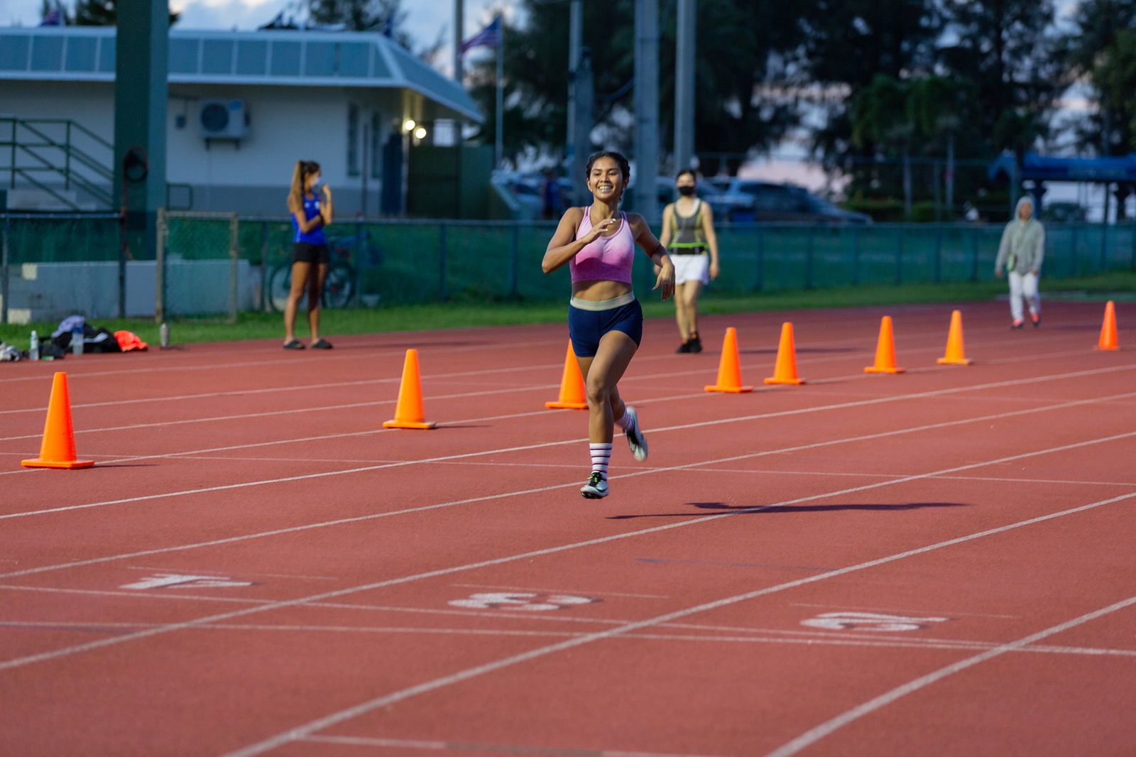 Reylynn Sapong pushes through the final stretch of the 400m event of the Oceania Athletics Association Virtual Championships at the Oleai Sports Complex on Dec. 22.
