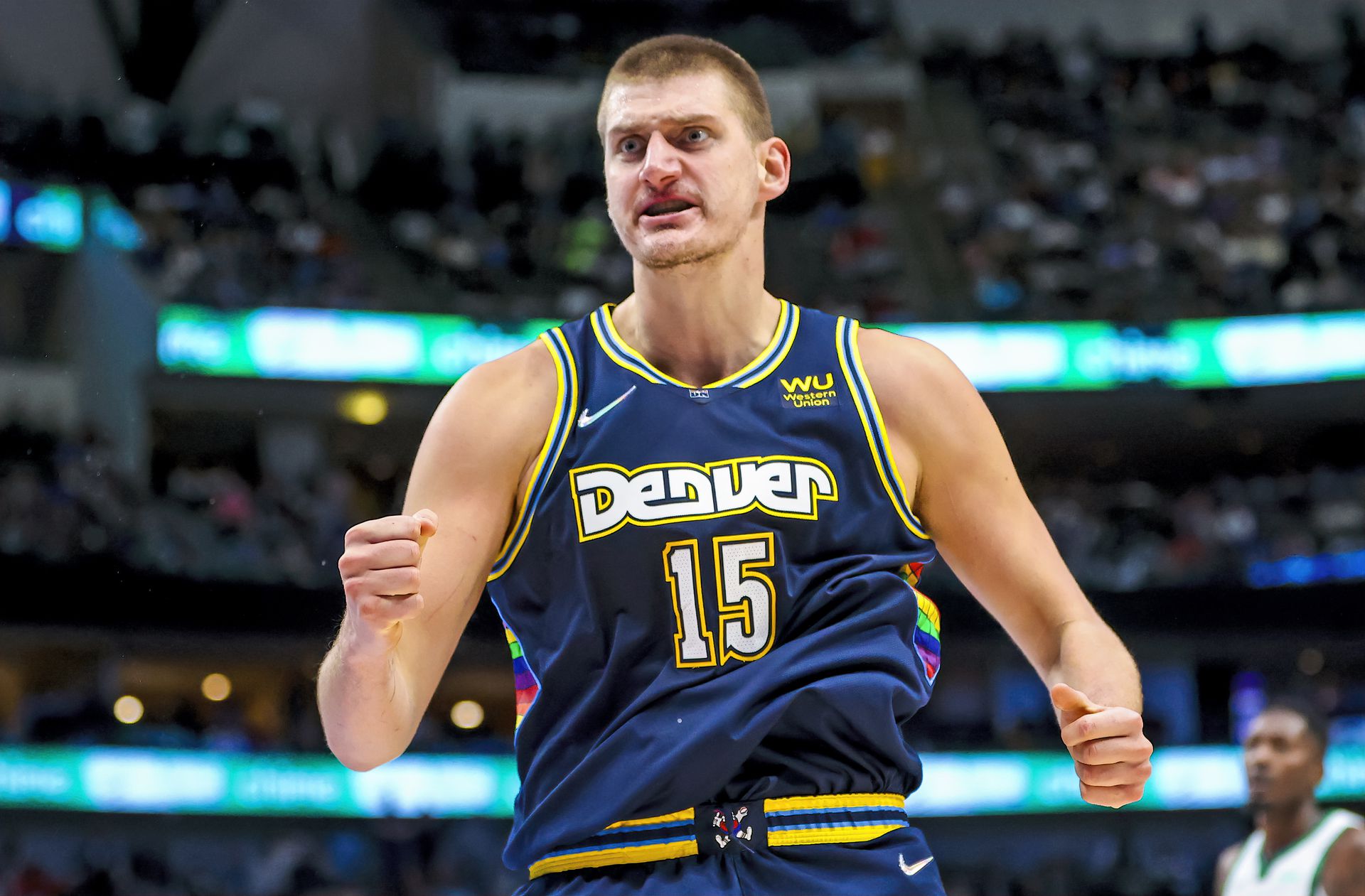 Denver Nuggets center Nikola Jokic (15) reacts after scoring during the second half against the Dallas Mavericks at American Airlines Center in Dallas, Texas on Nov. 15, 2021.