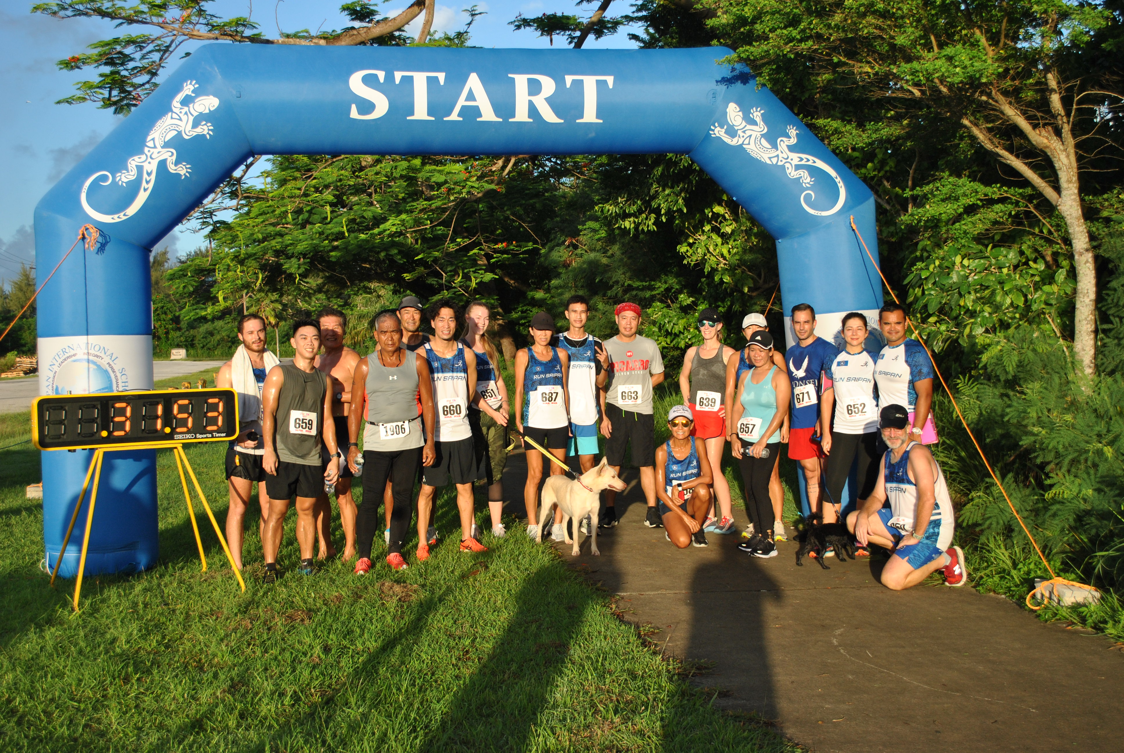Run Saipan members pose for a photo following a 5K underground race event.