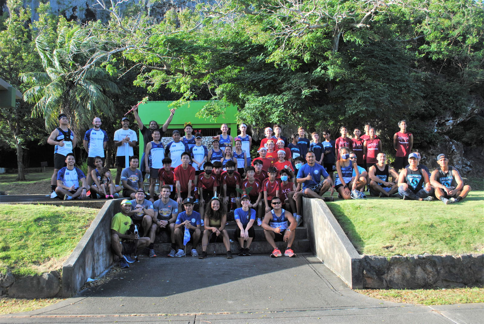 The participants of the 40th Annual Christmas Island Relay pose for a group photo at the Last Command Post in Marpi on Saturday.