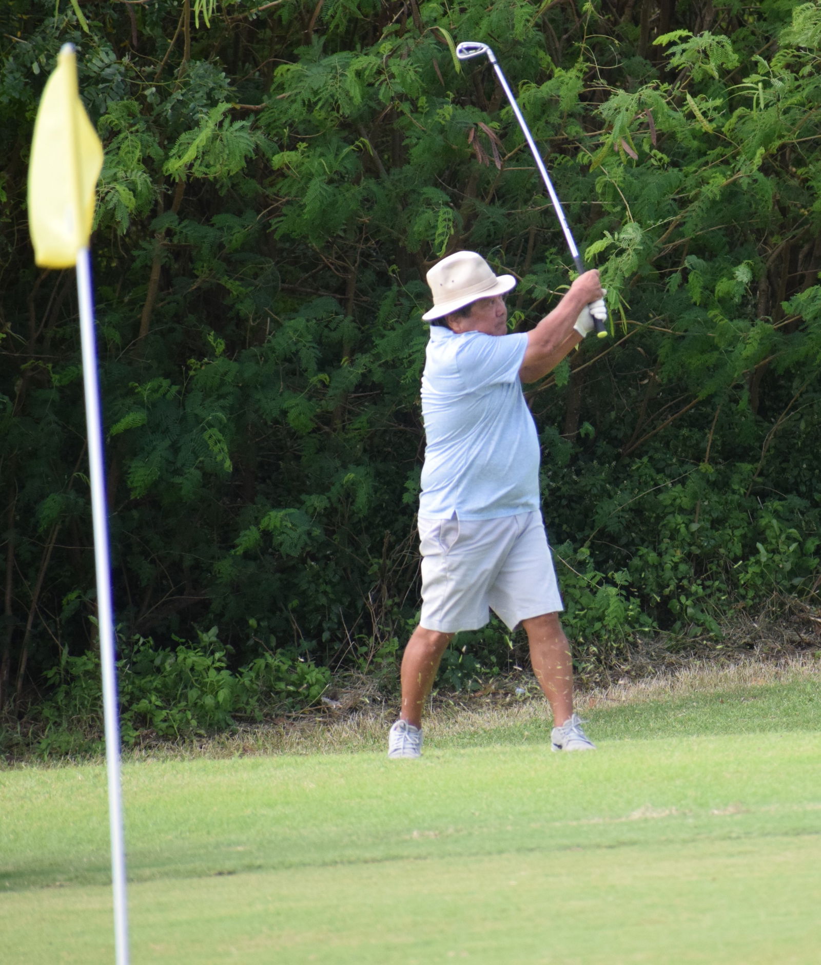 Super Senior Flight Nick Sablan tees off to Hole No. 10.