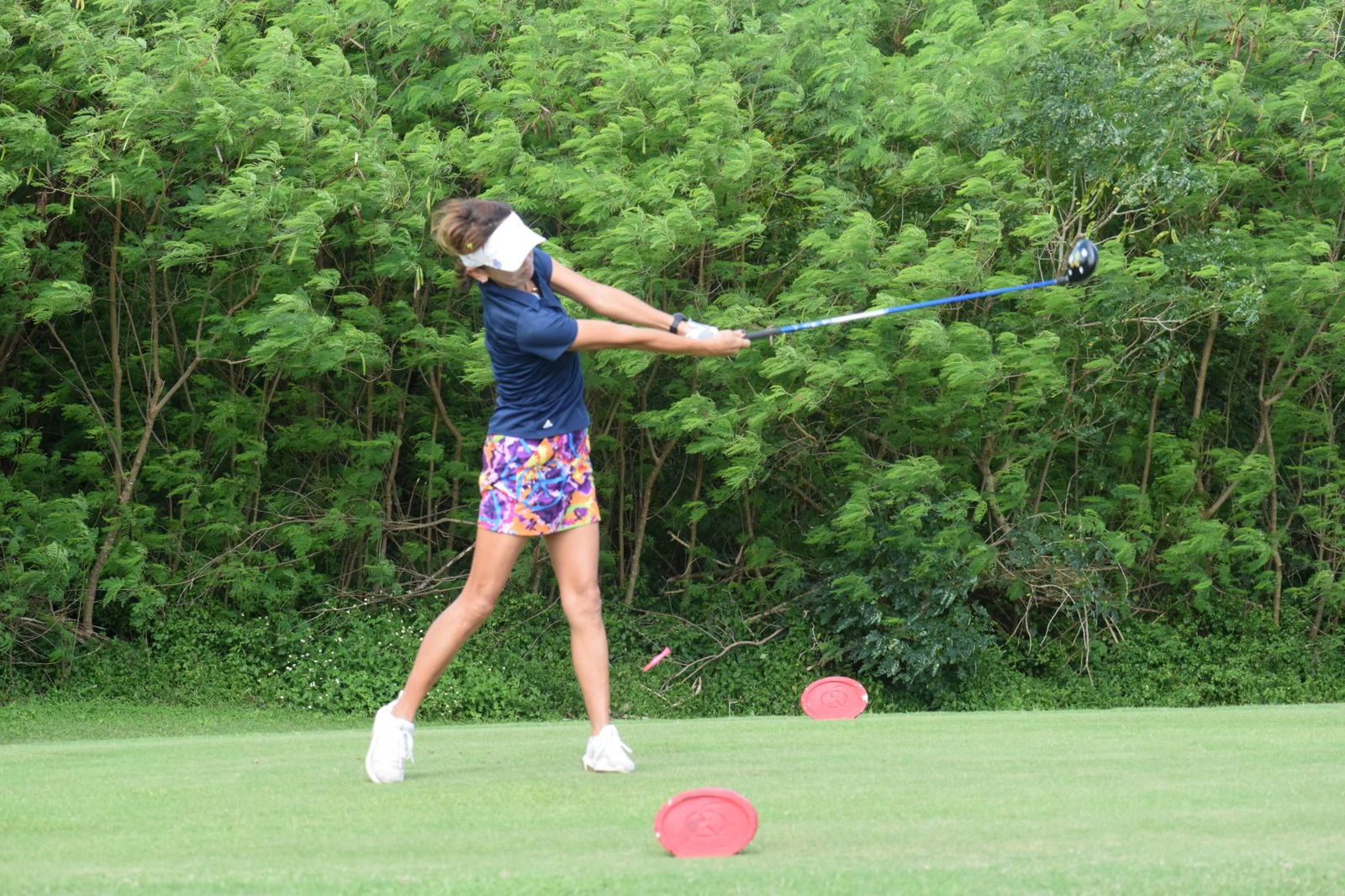Ladies Flight player Yuko Togawa swings for Hole No. 12.