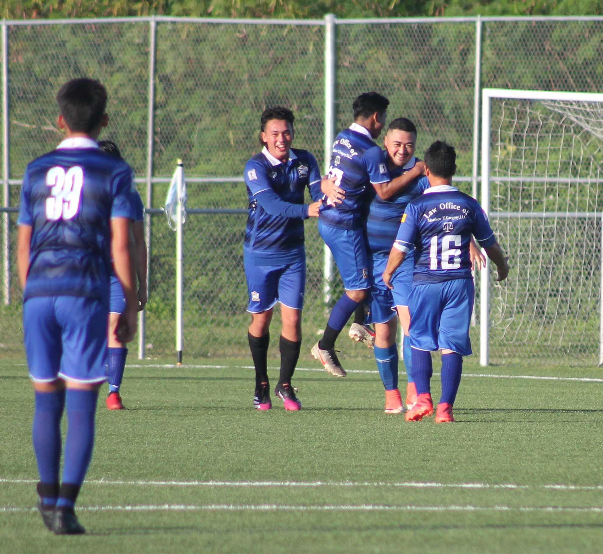 Eleven Tiger players celebrate after a goal. NMI U18 NT won, however, 2-1, and will face Tan Holdings Football Club in the championship game on Dec. 12 at 6 p.m. at the NMI Soccer Training Center.
