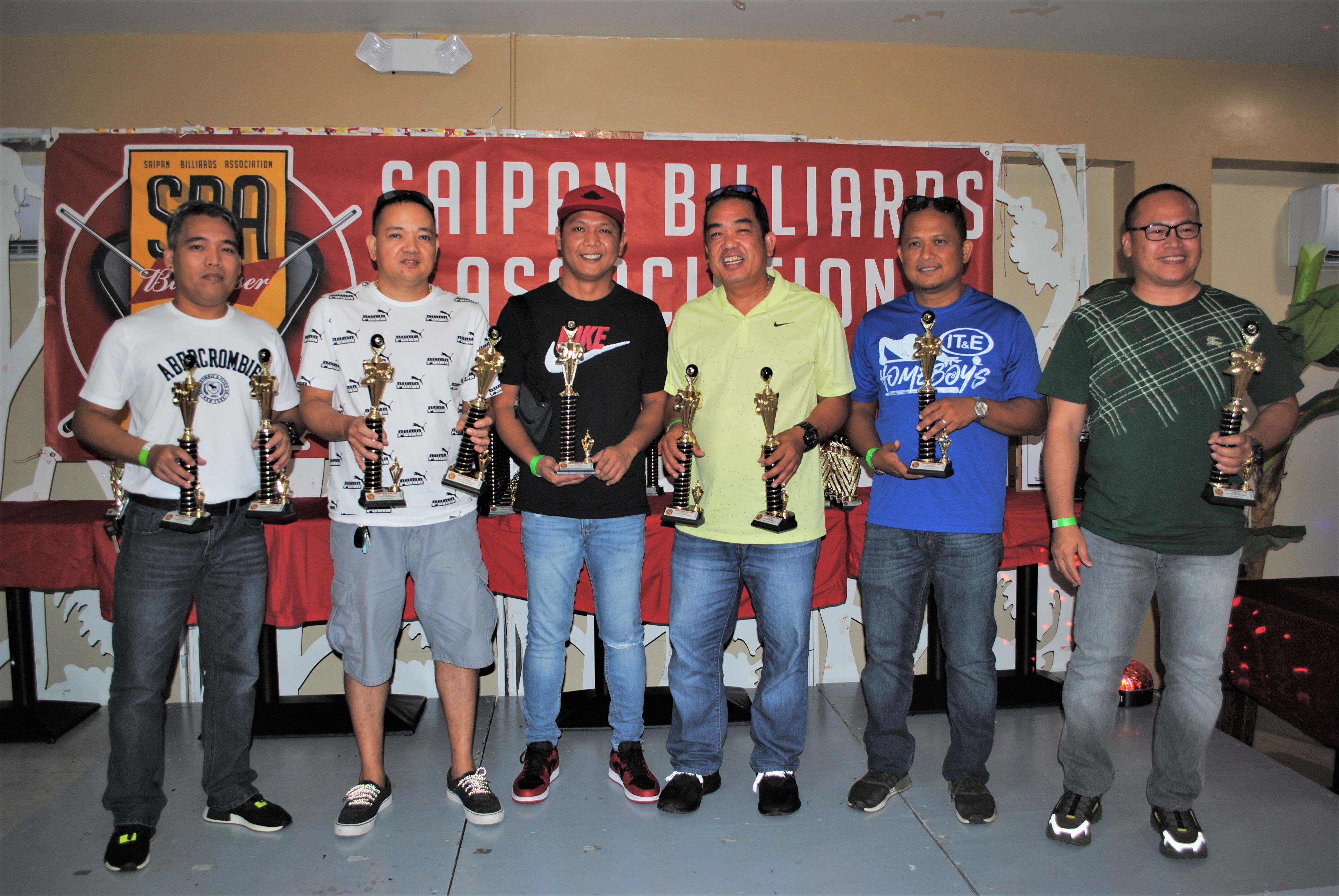 Last Shot IT&E Destroyers pose with the Tuesday Division second place trophies.