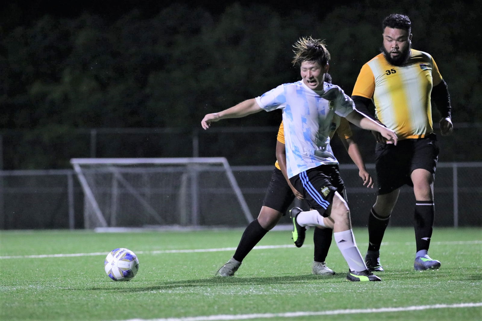 Saipan United's Kuu Nishimura intercepts the possession during a Hafa Adai Fun Cup game at the NMI Soccer Training Center.