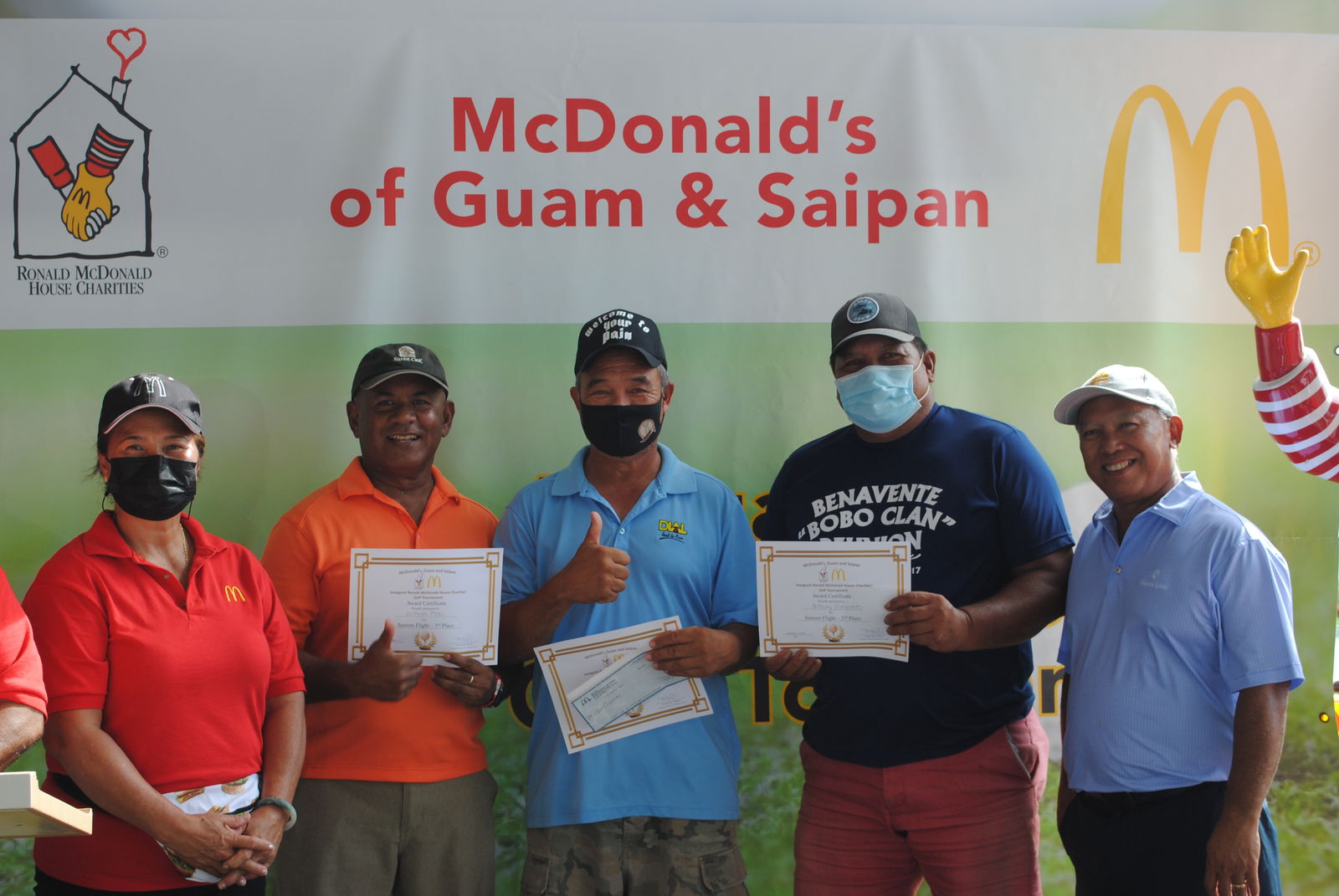 McDonald's Saipan & Guam co-owner Marcia Ayuyu with Wilhelm Maui, Joe Camacho, Anthony Benavente and McDonald's Saipan & Guam president and co-owner Joe Ayuyu Sr. during the awards ceremony at Laolao Bay Golf & Resort on Saturday.