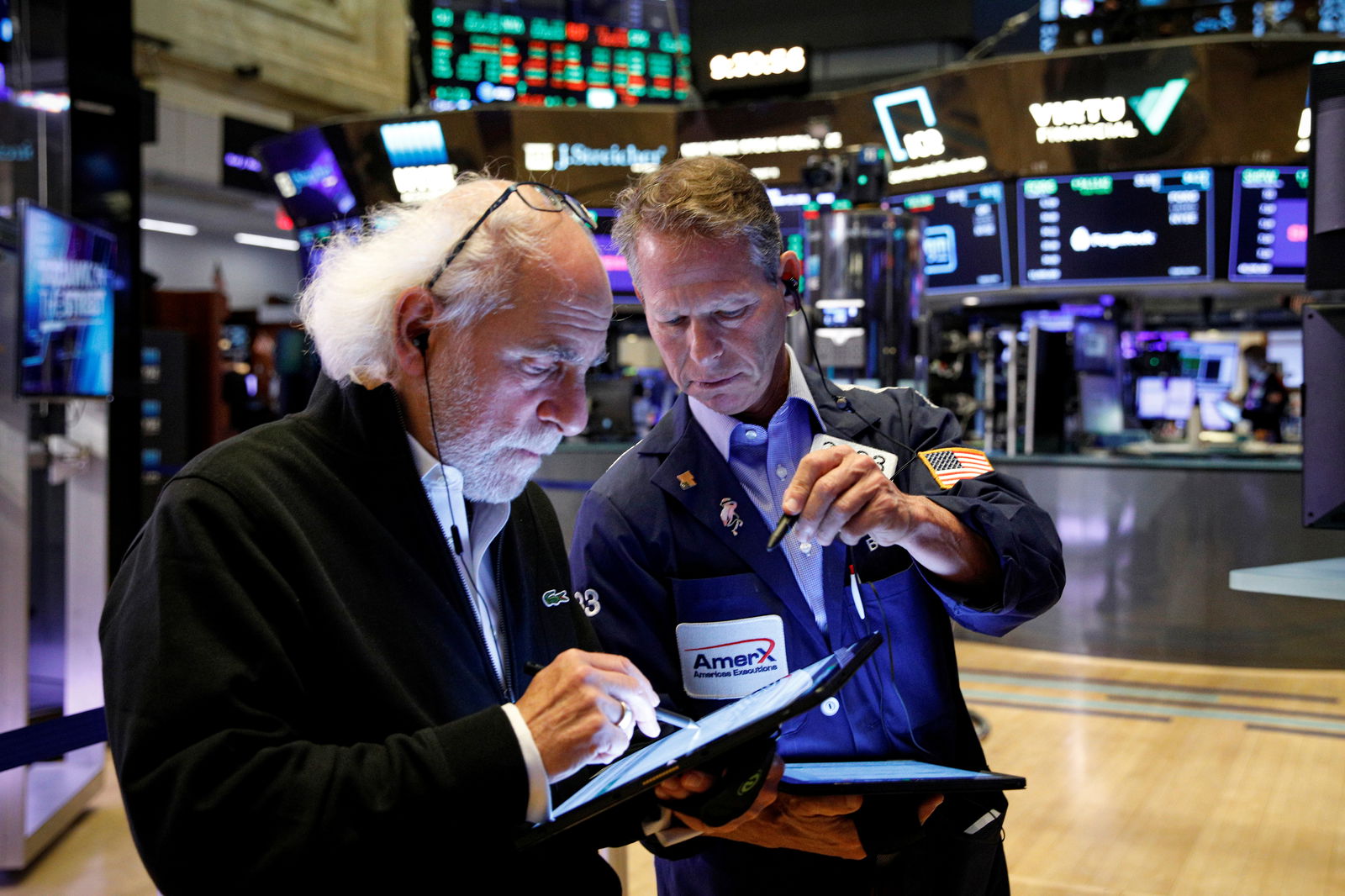 Traders work on the floor of the New York Stock Exchange in New York City, Oct. 20, 2021.