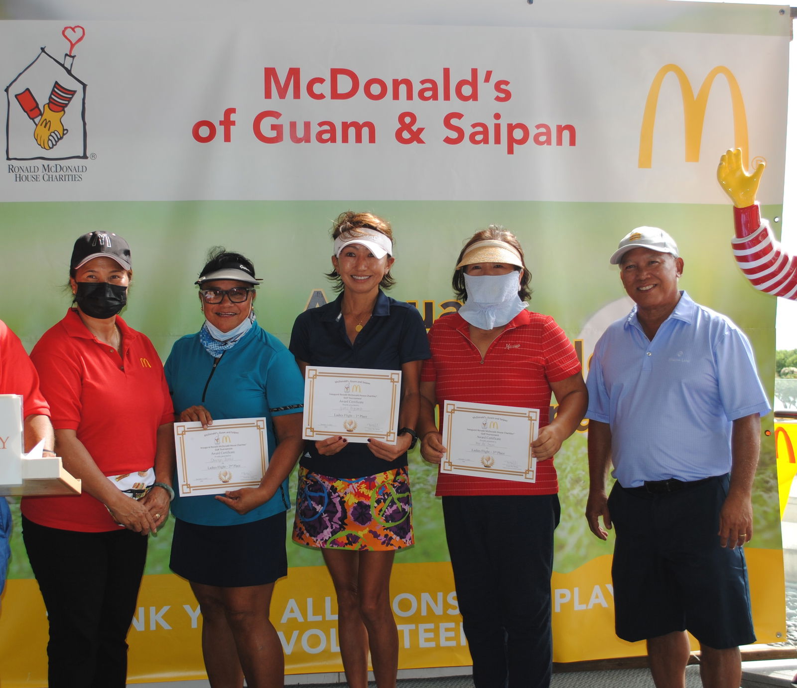 From left, McDonald's Saipan & Guam co-owner Marcia Ayuyu, Sherlyn Jones, Yuko Togawa, Ma Ea Jeon and McDonald’s Saipan and Guam president and co-owner Joe Ayuyu Sr. pose  for a photo following the inaugural Ronald McDonald House of Charities Golf Tournament Saturday at Laolao Bay Golf & Resort.