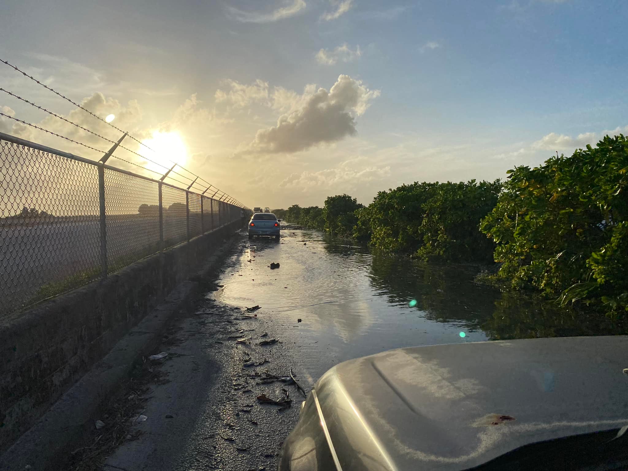 For three consecutives starting Saturday afternoon, the road next to Amata Kabua International Airport in Majuro was flooded and debris-strewn by a high tide driven by ongoing sea level rise and winds generated by a distant storm. Heavy equipment operators were called in to clear the roads to allow vehicles to pass.