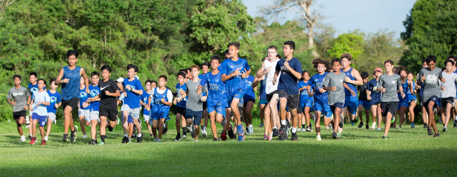 Runners head out to the course during the 2021 PSS/NMA Cross Country Championships at the  Saipan Country Club golf course in October.