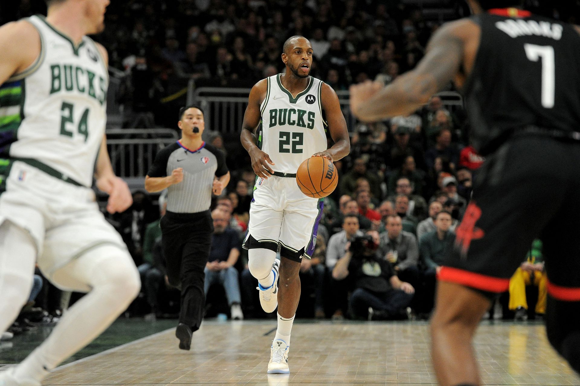 Milwaukee Bucks forward Khris Middleton (22) brings the ball up court against Houston Rockets int the first half at Fiserv Forum Milwaukee, Wisconsin, Dec. 22, 2021.