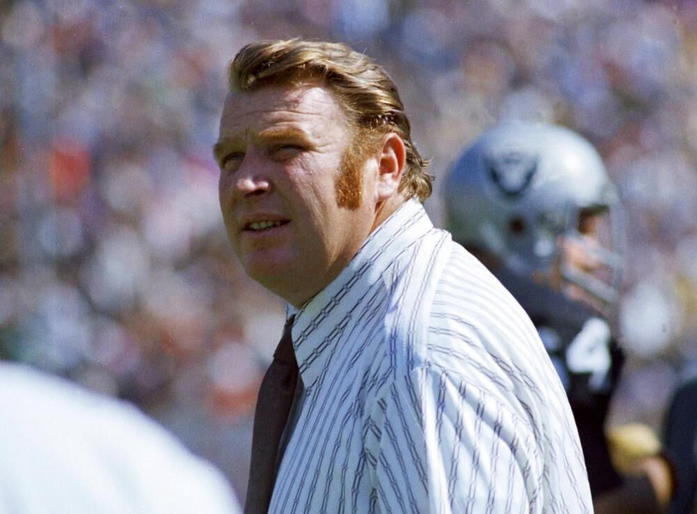 Oakland Raiders coach John Madden stands on the sideline during an NFL football game in October 1978.