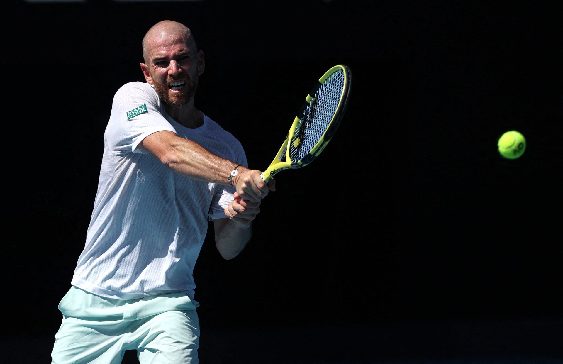 France's Adrian Mannarino in action during his fourth round match against Spain's Rafael Nadal at Melbourne Park, Melbourne, Australia, Jan. 23, 2022.