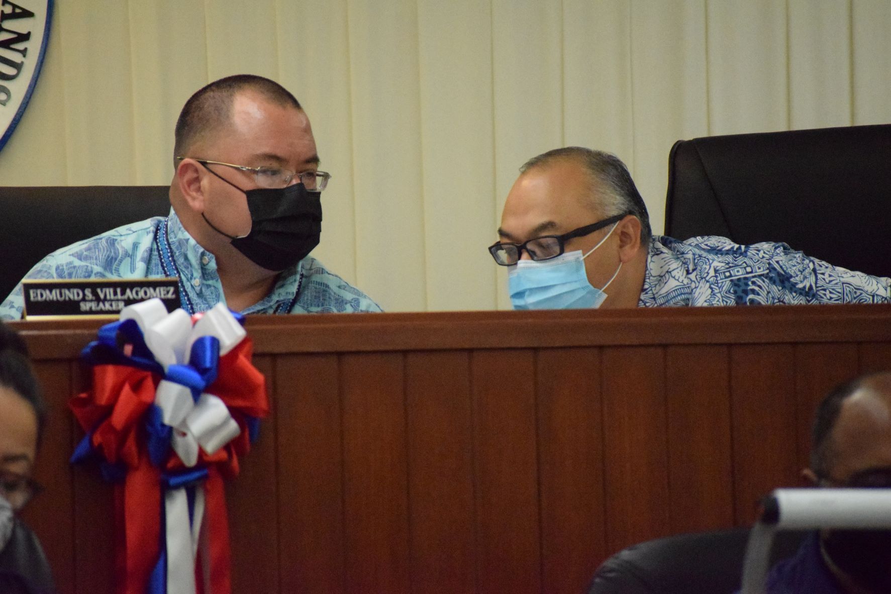 Speaker Edmund S. Villagomez and Vice Speaker Blas Jonathan Attao confer during the House session on Wednesday.
