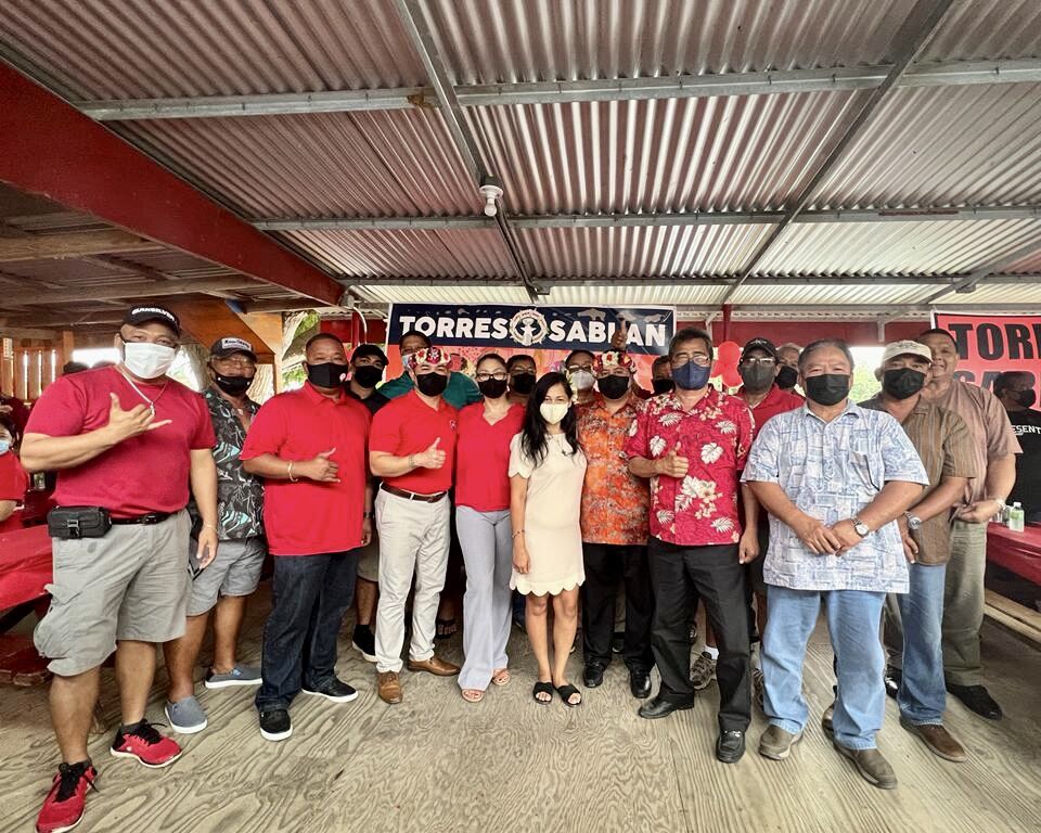 The CNMI Republican gubernatorial ticket with other GOP candidates, officials and supporters pose for  photo at their campaign headquarters in Garapan on Saturday.