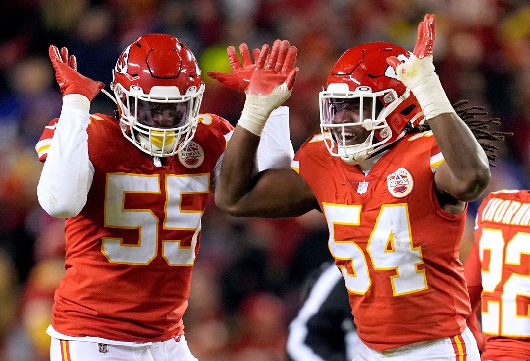 Kansas City Chiefs defensive end Frank Clark (55) and outside linebacker Nick Bolton (54) reacts against the Buffalo Bills during the first half in the AFC Divisional playoff football game at GEHA Field at Arrowhead Stadium in Kansas City, Missouri, Jan. 23, 2022.