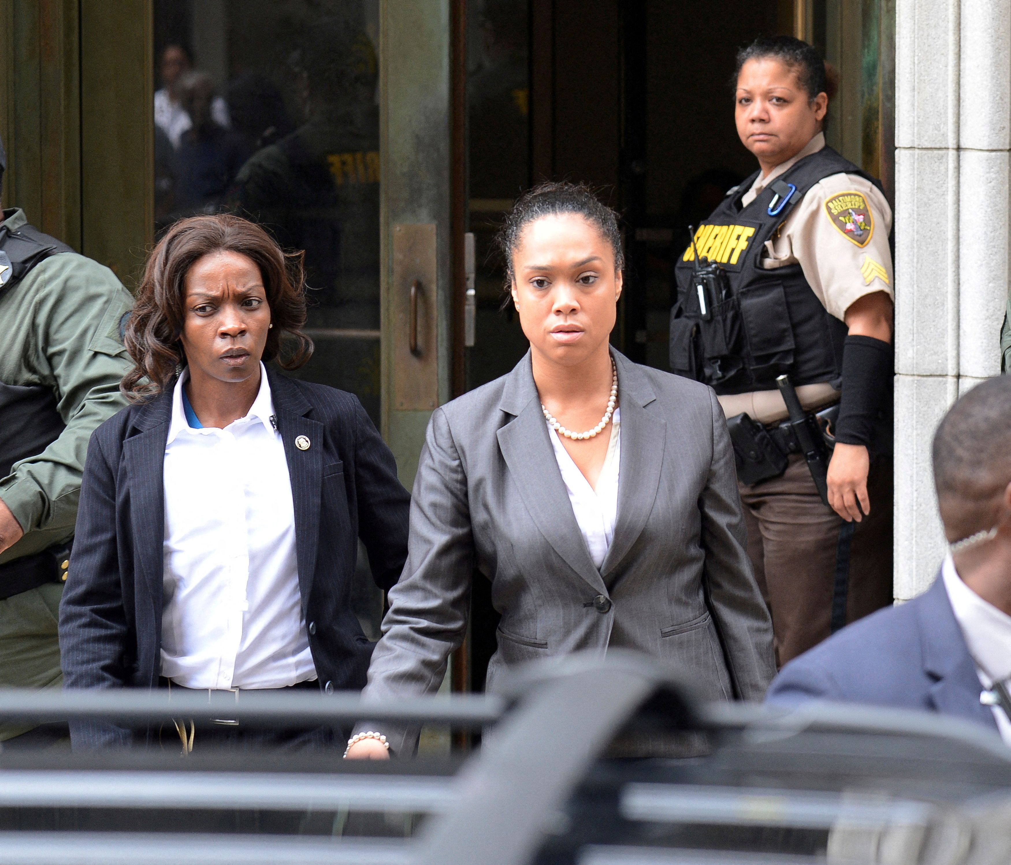 Baltimore City State’s Attorney Marilyn Mosby, center, departs the courthouse in Baltimore, Maryland, U.S. on June 23, 2016.