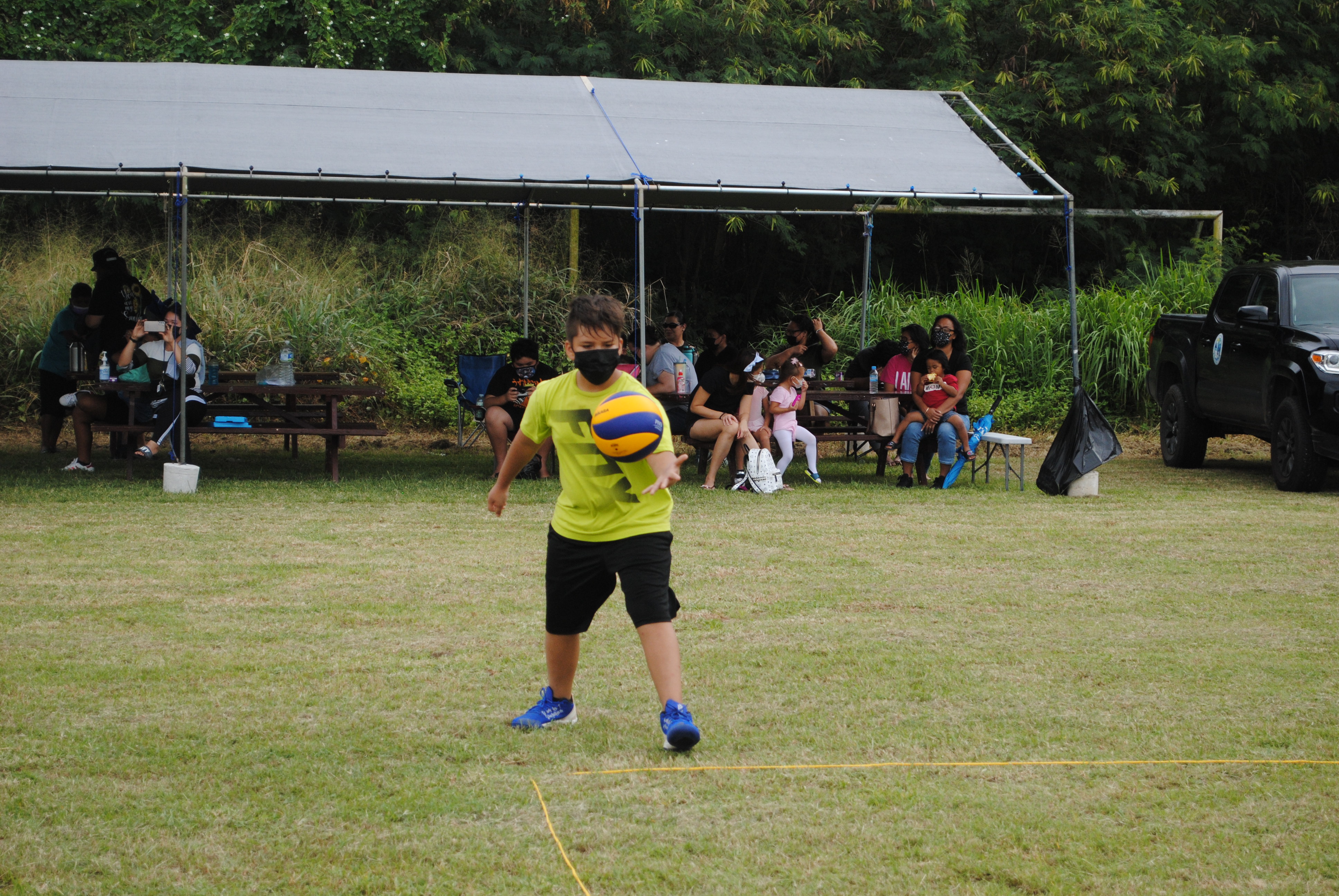Kagman Elemenry School 1's Stanley Iakopo during a co-ed volleyball game Saturday at the Chacha Oceanview Middle School field.