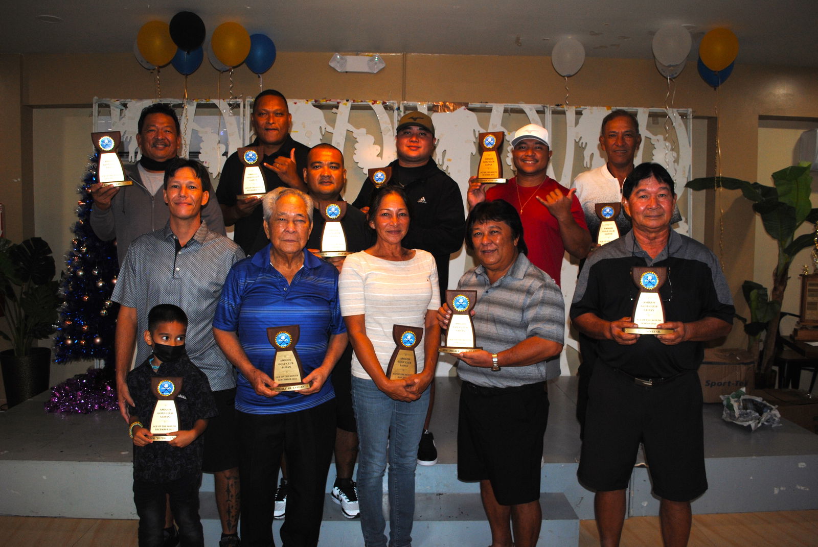 The Amigos Golf Club's Aces of the Month pose with their trophies during  Friday's awards banquet at the Rendezvous Restaurant.