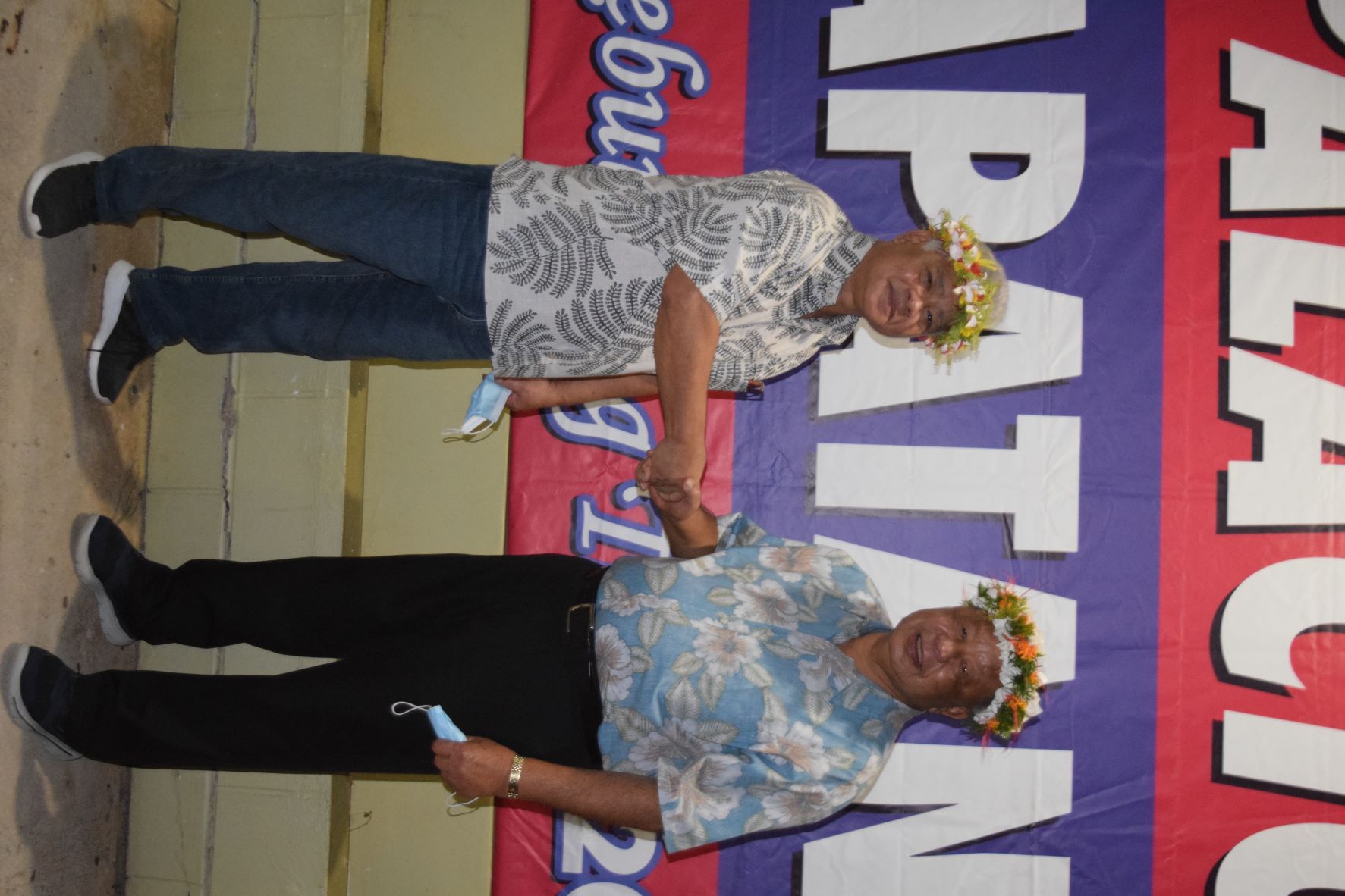 Independent 2022 gubernatorial election candidates Lt. Gov. Arnold I. Palacios and Saipan Mayor David Apatang shake hands at their campaign headquarters on Beach Road in Garapan.