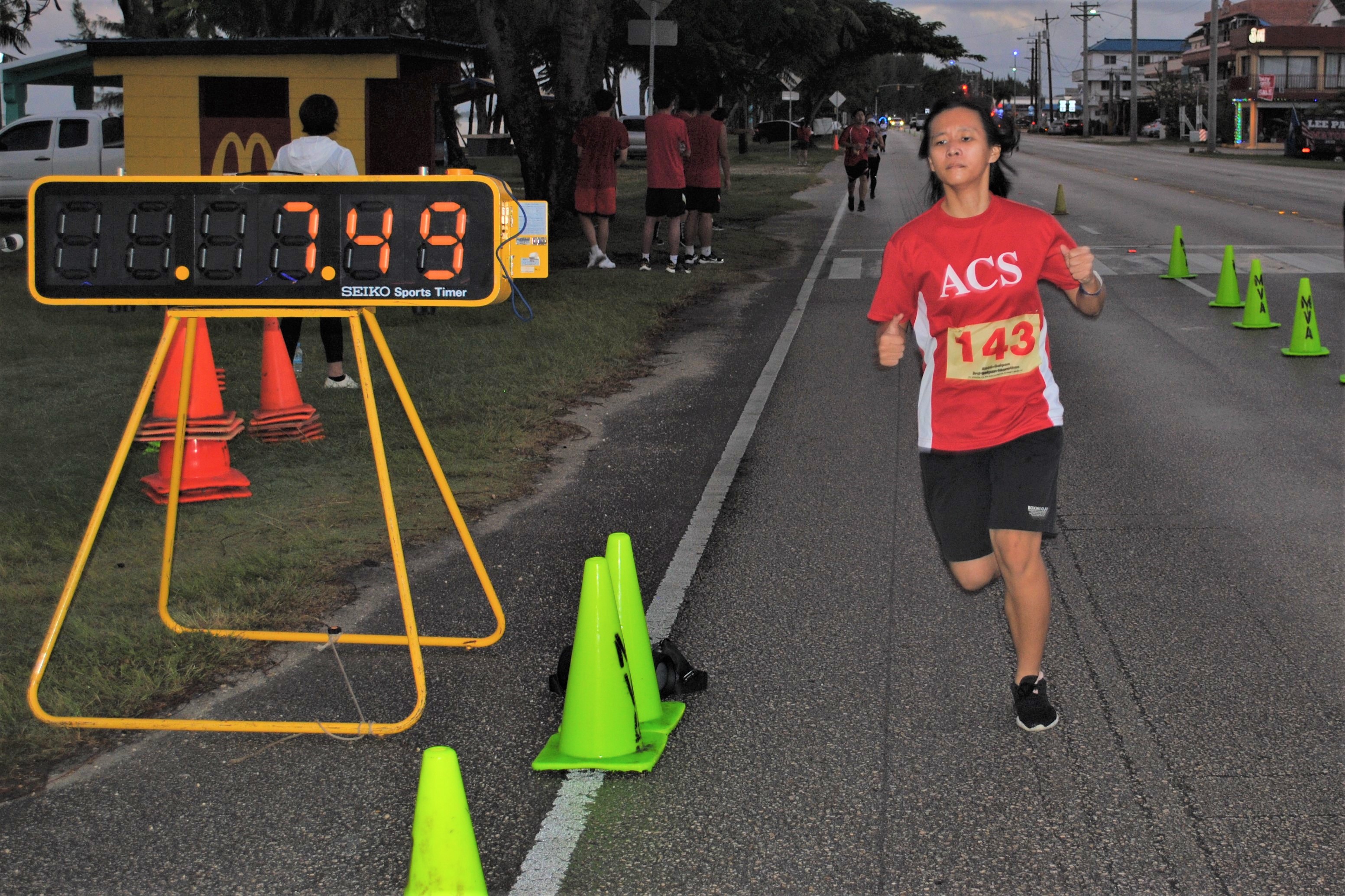 Sally Wu crosses the finish line.