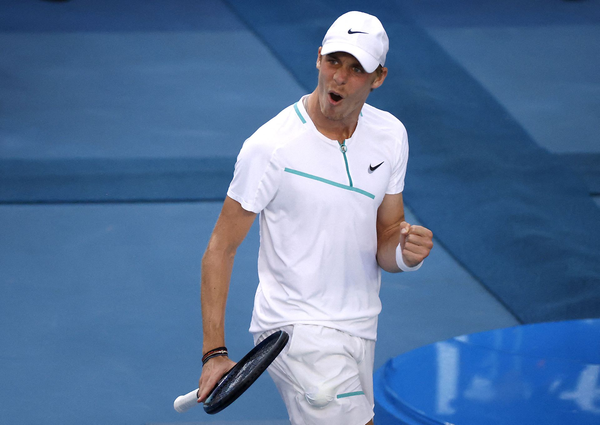 Canada's Denis Shapovalov celebrates winning his fourth round match against Germany's Alexander Zverev in the Australian Open, Sunday.