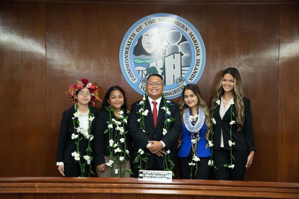 The members of the  18th Youth Congress, from left: Youth Sens. YuriHana DLG Sasamoto, Abriette Manglona, Easton Joel Dela Cruz, Cielo G. Long and Liekeila'akata Iakopo pose for a photo following their inauguration in May 2021.