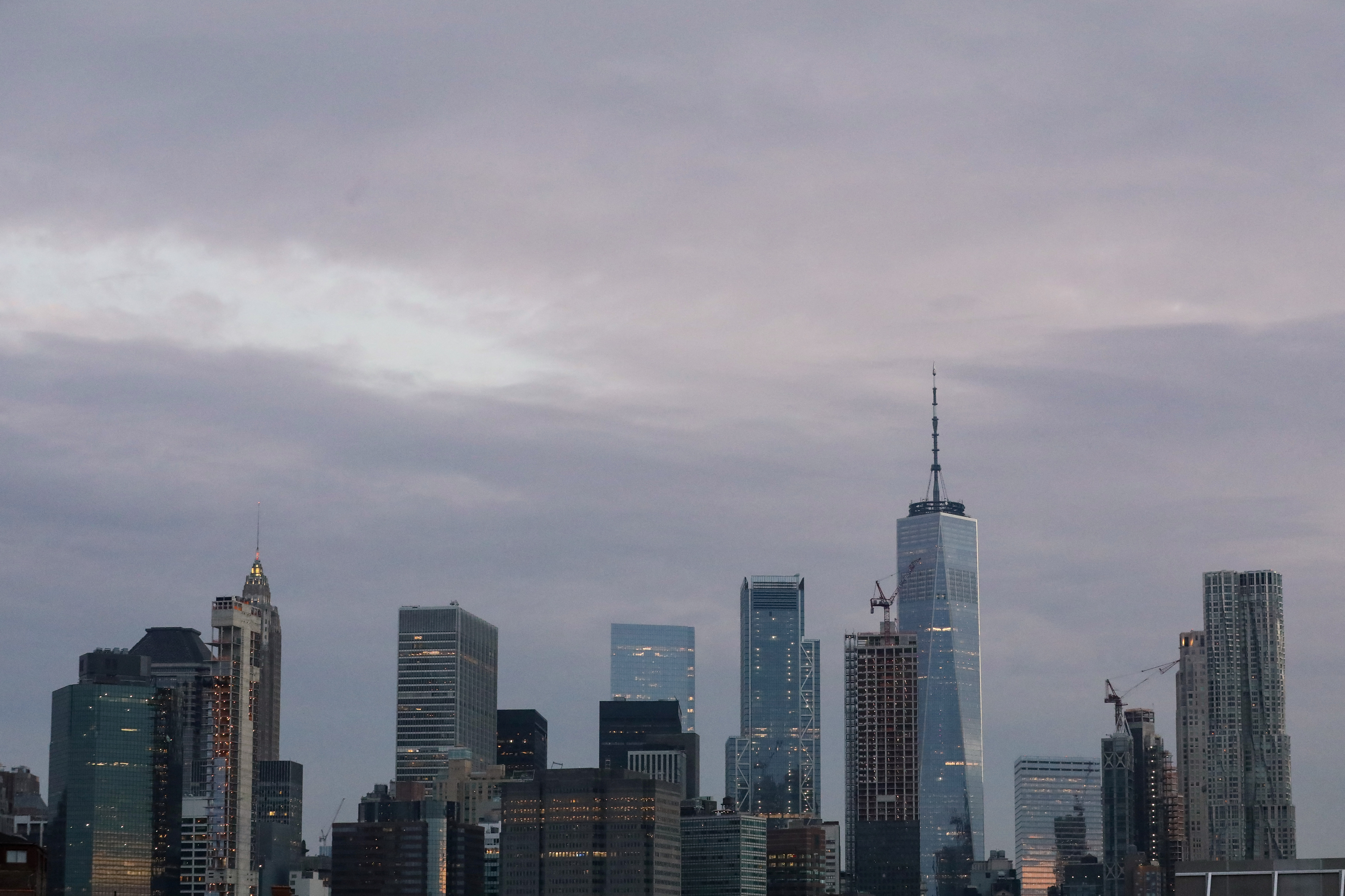 The skyline of lower Manhattan is seen before sunrise in New York City, July 17, 2019.