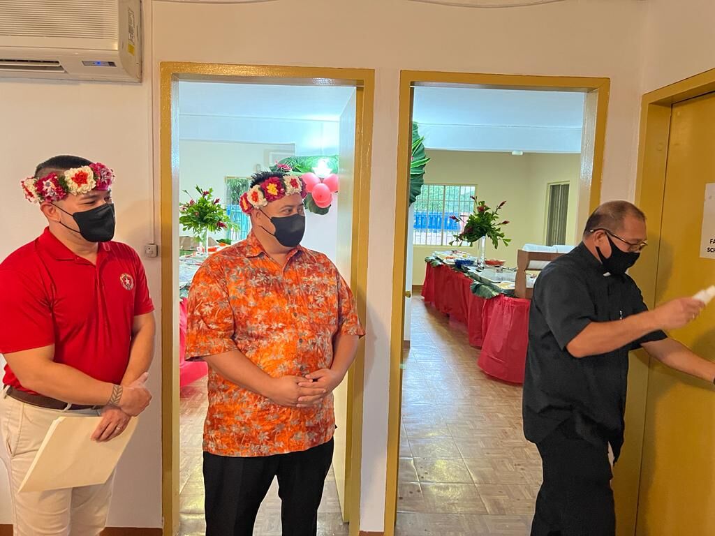 Father Rey Rosal, right, blesses the newly opened CNMI Republican Party campaign headquarters in Garapan on Saturday as Gov. Ralph DLG Torres and running mate Senate Floor Leader Vinnie F. Sablan look on.