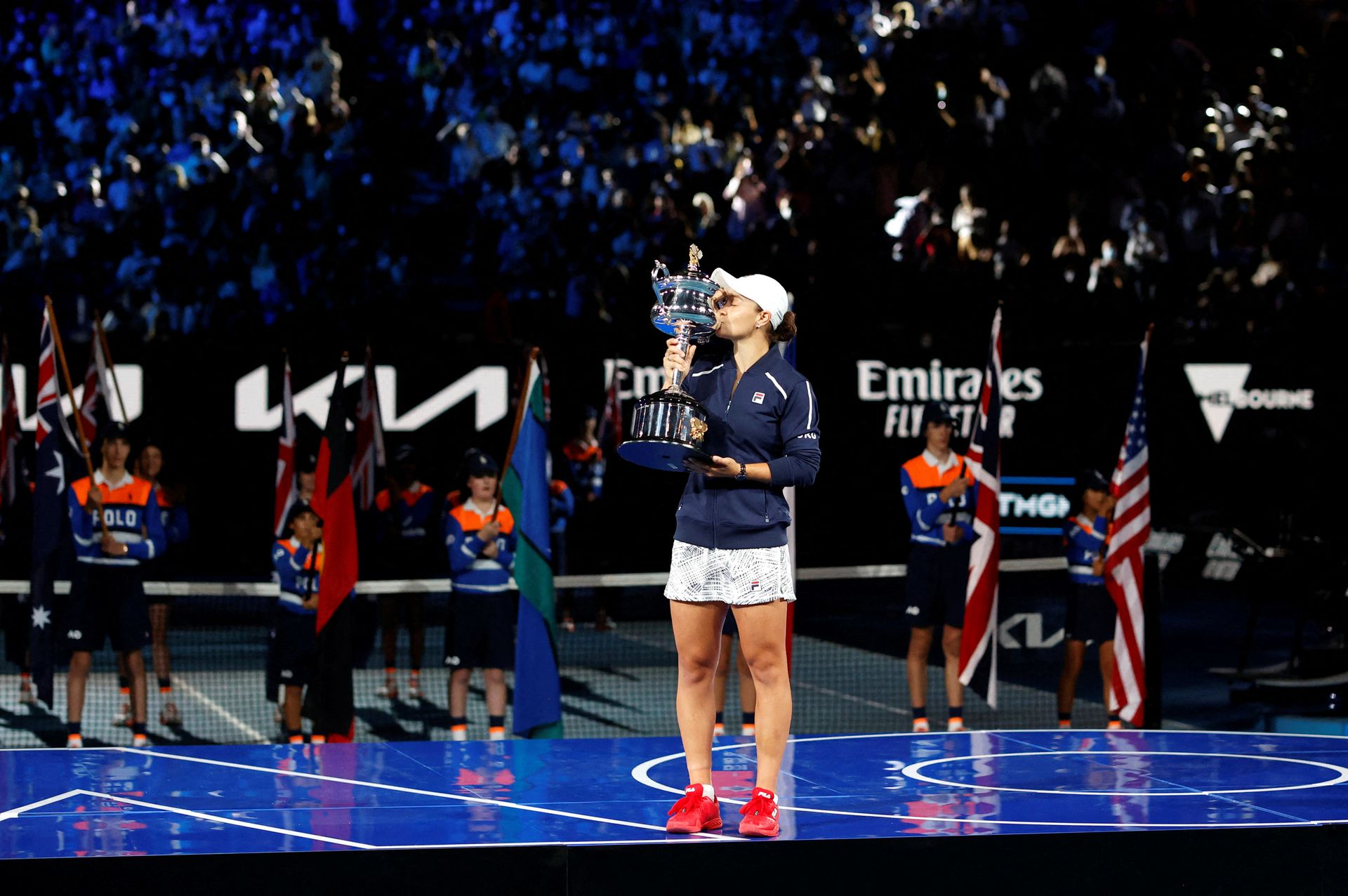 Australia's Ashleigh Barty celebrates winning the Australian Open final against Danielle Collins of the U.S. with the trophy on Jan. 29, 2022.