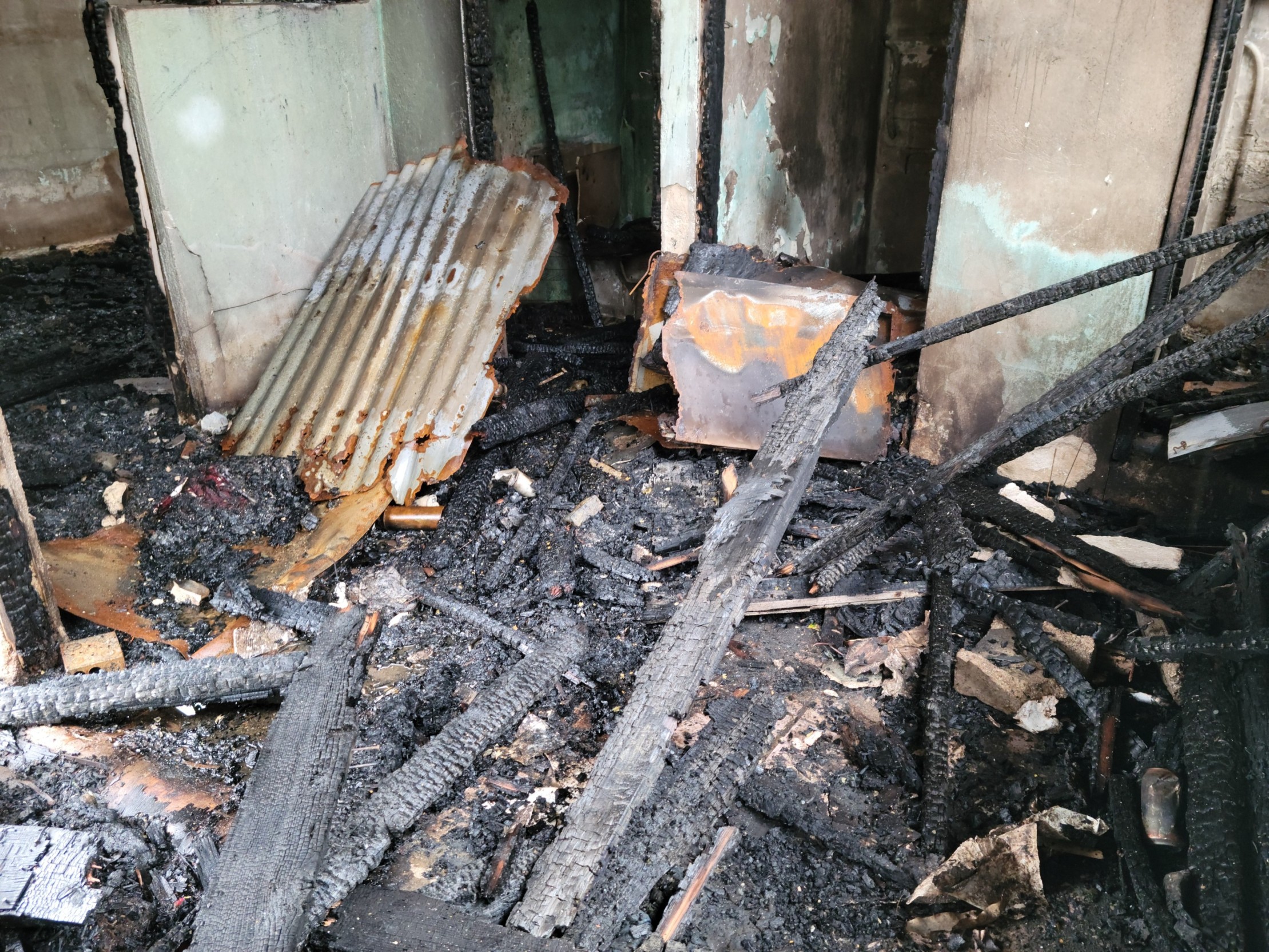 What was left of a former auto shop in Garapan after it was damaged by fire late Friday afternoon.