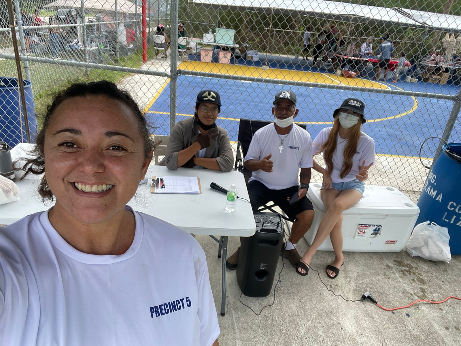 Rep. Leila Staffler, left, takes a “selfie” with Kagman High School volunteer Joaquin Rabauliman, and Rep. Richard Lizama’s office staff members John Salas and Antonia Lizama.