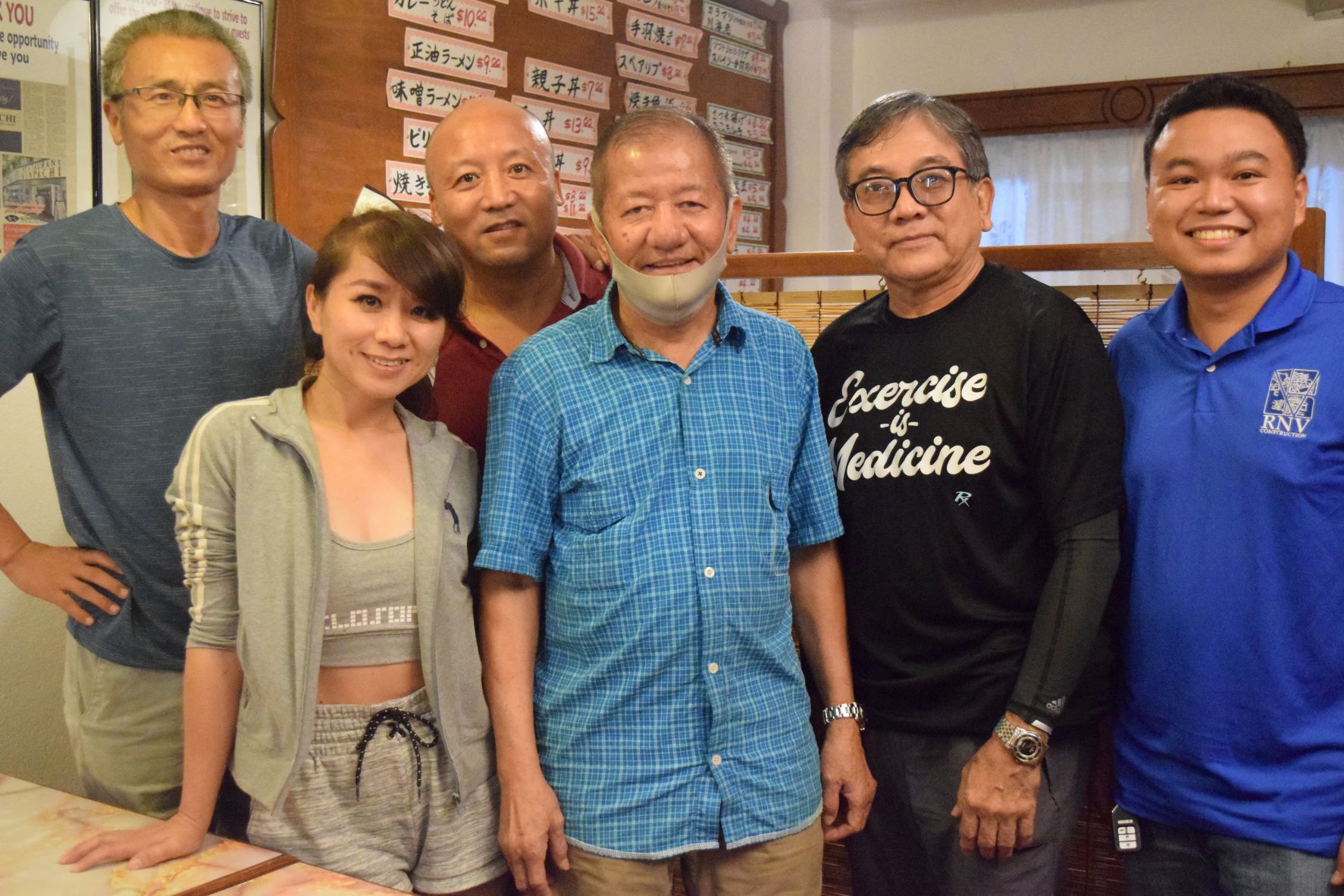 The members of the Northern Marianas Table Tennis Federation, from left, Charlie Cheng, Mimi Zhang, Liu Fuliang, Budhi Guring, Mario Espeleta and Jayrold Villacrusis pose for a photo during a meeting  Thursday at Kinpanchi Restaurant in  Garapan.
