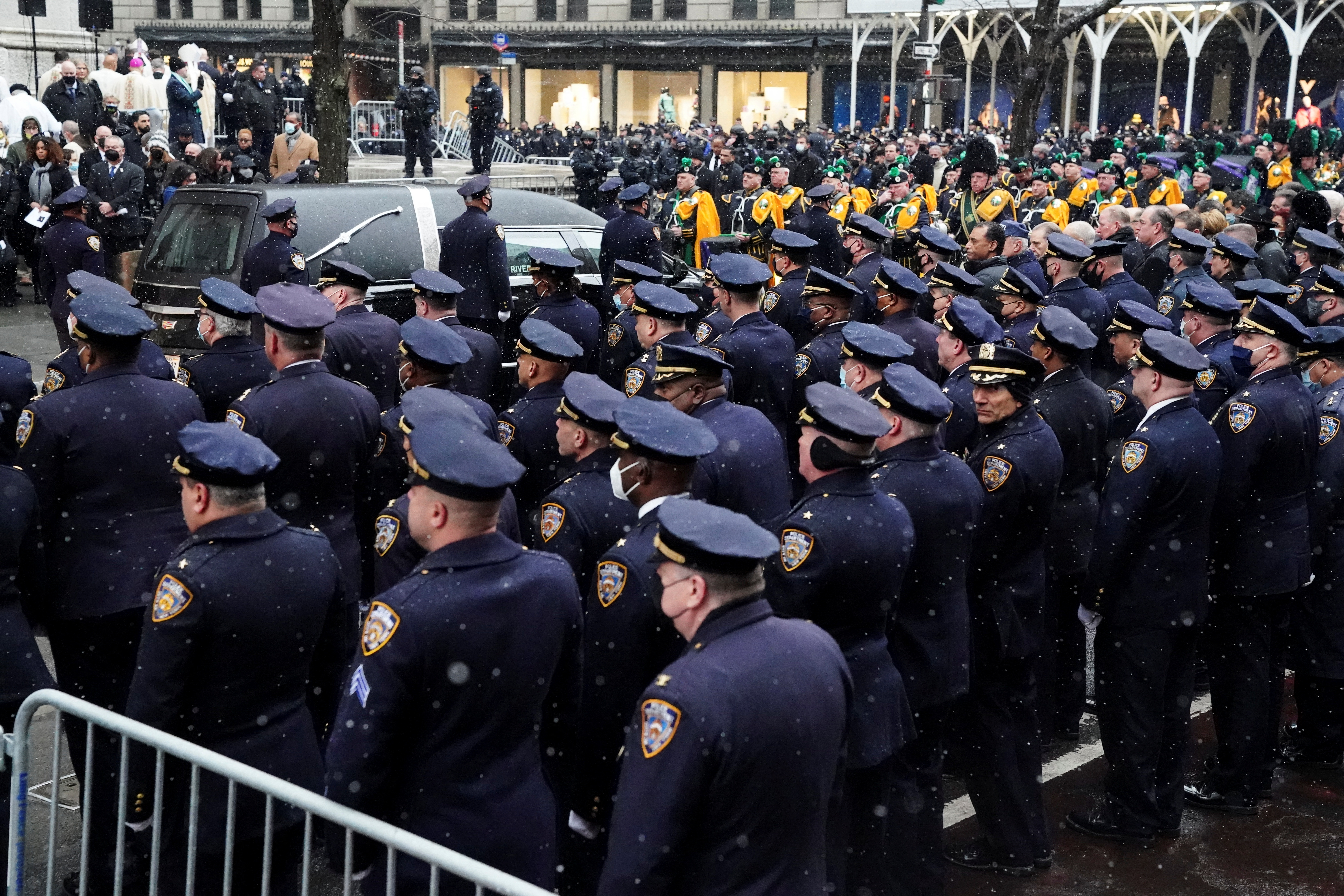 Police officers attend a funeral service at St. Patrick's Cathedral in the Manhattan borough of New York City on Jan. 28, 2022 for New York City Police Department officer Jason Rivera, who was killed in the line of duty while responding to a domestic violence call.