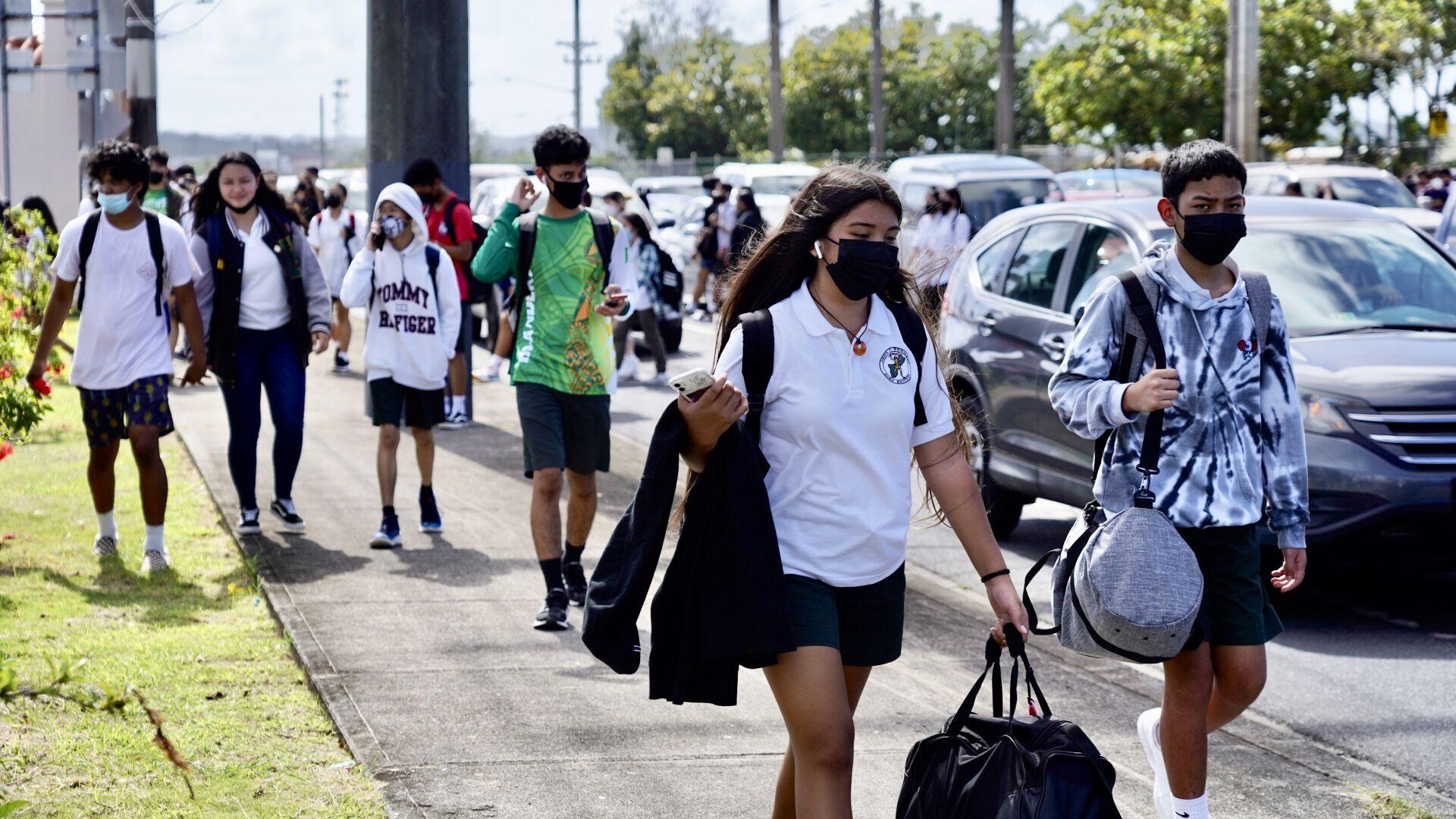 John F. Kennedy High School students leave campus after school Dec. 10, 2021.